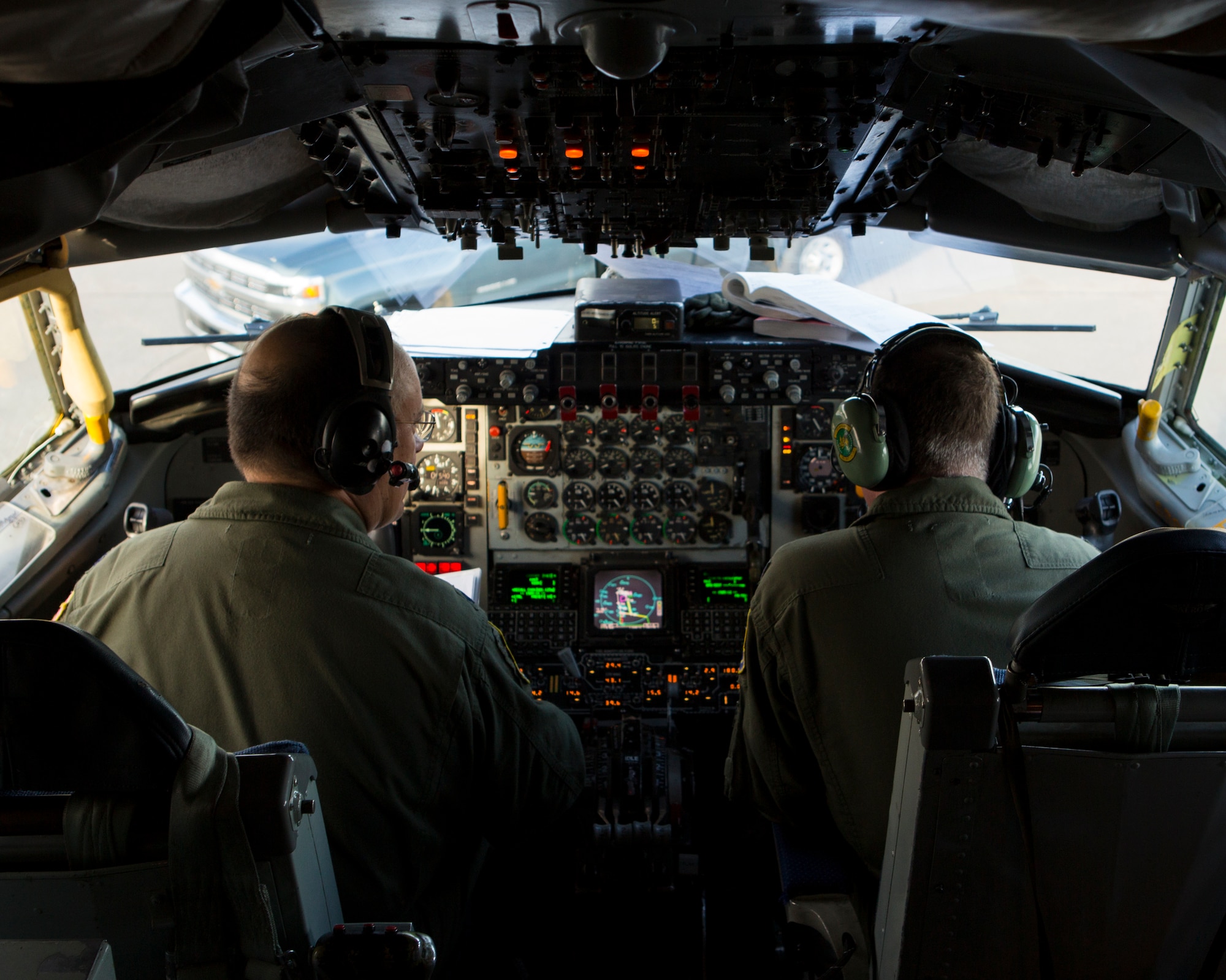U.S. Air Force Lt. Col. Kenneth W. Harris, left, and Lt. Col. Dan J. Davis, both KC-135R pilots, Air Force Reserve Command, conduct pre-flight inspections inside a U.S. Air Force KC-135T Stratotanker assigned to the 92nd Air Refueling Wing, Fairchild Air Force Base, Wash., prior to a training mission during Exercise Northern Edge 15 at Eielson Air Force Base, Alaska, June 16, 2015. Northern Edge is Alaska’s premier joint training exercise designed to practice operations, techniques and procedures as well as enhance interoperability among the services. Thousands of participants from all services, Airmen, Soldiers, Sailors, Marines and Coast Guardsmen from active duty, Reserve and National Guard units are involved. (U.S. Marine Corps photo by Cpl. Suzanne Dickson/ Released)