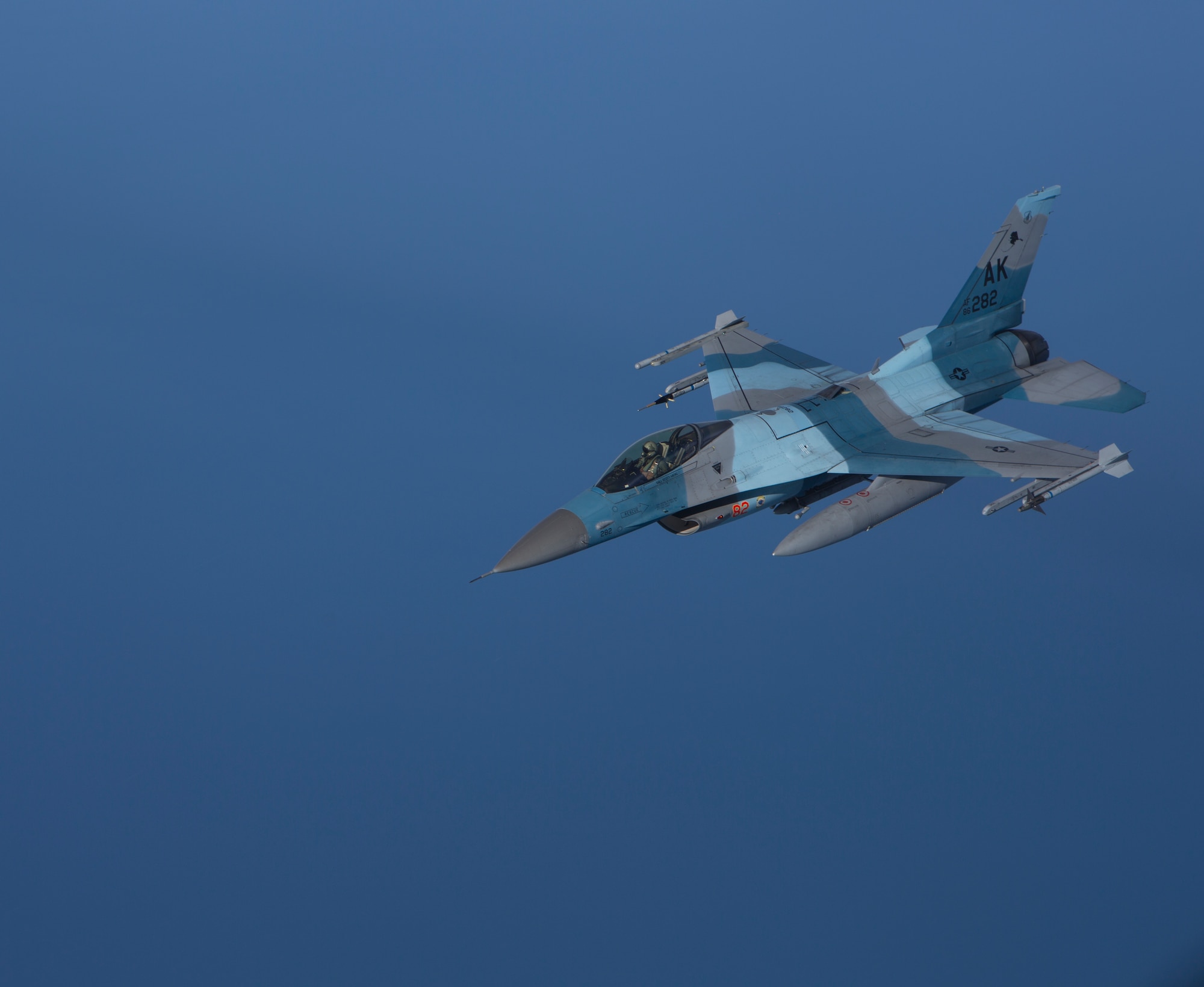 A U.S. Air Force F-16 Fighting Falcon assigned to the 354th Fighter Wing, Eielson Air Force Base, Alaska, conducts a training mission over the Gulf of Alaska June 16, 2015, during Exercise Northern Edge 15. Northern Edge is Alaska’s premier joint training exercise designed to practice operations, techniques and procedures as well as enhance interoperability among the services. Thousands of service members from active duty, Reserve and National Guard units are involved. (U.S. Marine Corps photo by Cpl. Suzanne Dickson/ Released)
