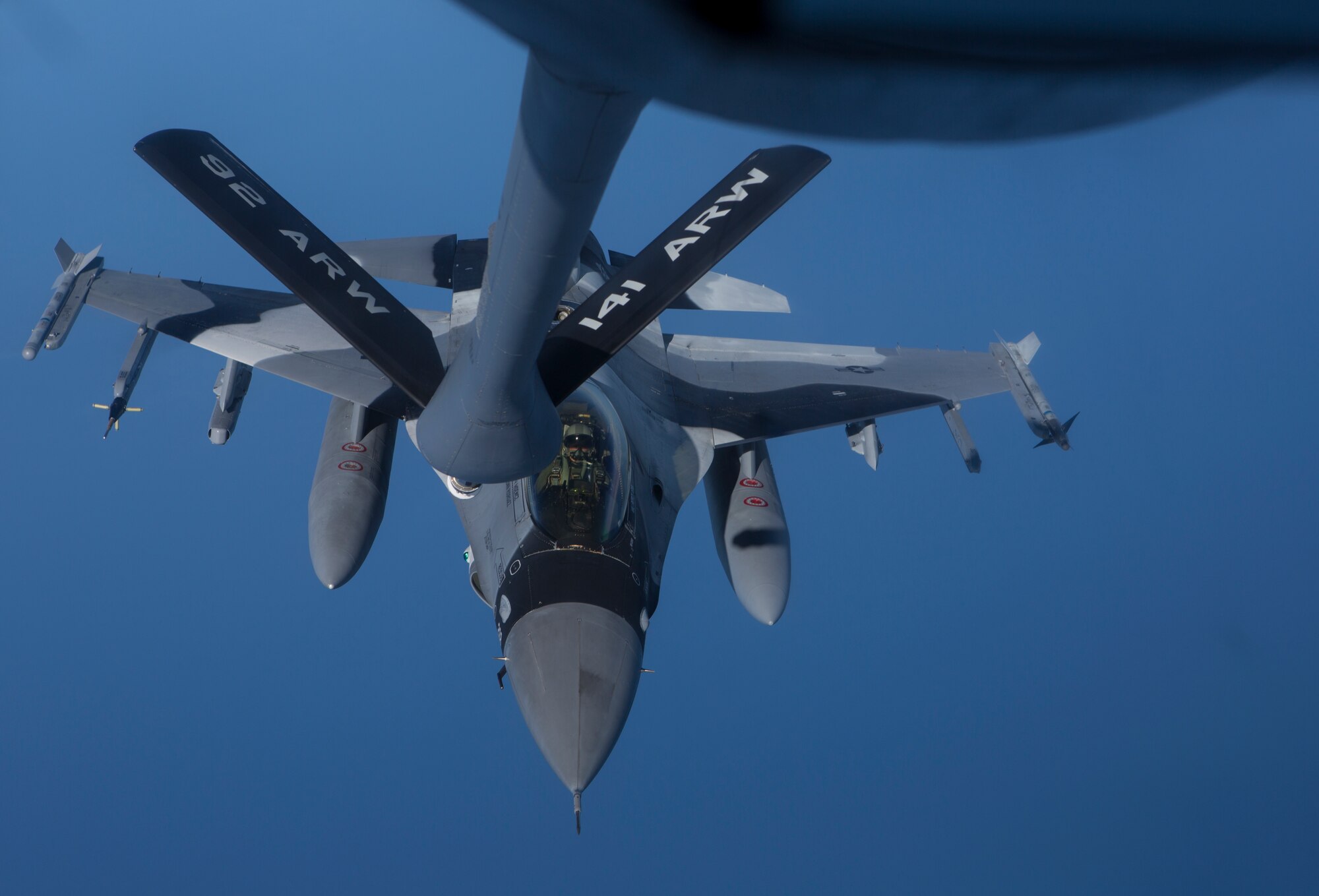 A U.S. Air Force F-16 Fighting Falcon assigned to the 354th Fighter Wing, Eielson Air Force Base, Alaska, aligns under the boom of a U.S. Air Force KC-135T Stratotanker assigned to the 92nd Air Refueling Wing, Fairchild Air Force Base, Wash., June 16, 2015, while conducting a training mission over the Gulf of Alaska during Exercise Northern Edge 15. Northern Edge is Alaska’s premier joint training exercise designed to practice operations, techniques and procedures as well as enhance interoperability among the services. Thousands of service members from active duty, Reserve and National Guard units are involved. (U.S. Marine Corps photo by Cpl. Suzanne Dickson/ Released)