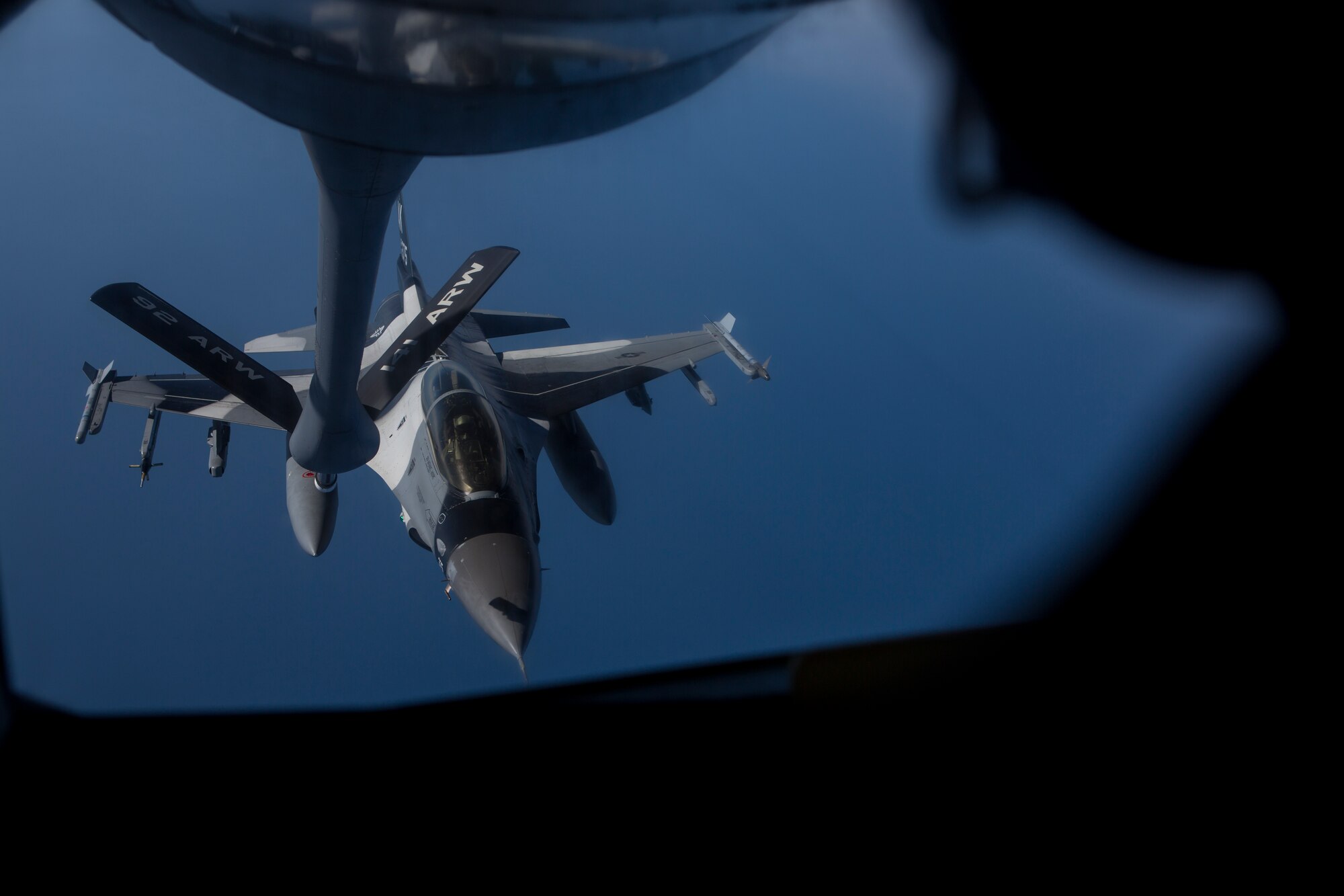 A U.S. Air Force F-16 Fighting Falcon assigned to the 354th Fighter Wing, Eielson Air Force Base, Alaska, aligns under the boom of a U.S. Air Force KC-135T Stratotanker assigned to the 92nd Air Refueling Wing, Fairchild Air Force Base, Wash., June 16, 2015, while conducting a training mission over the Gulf of Alaska during Exercise Northern Edge 15. Northern Edge is Alaska’s premier joint training exercise designed to practice operations, techniques and procedures as well as enhance interoperability among the services. Thousands of service members from active duty, Reserve and National Guard units are involved. (U.S. Marine Corps photo by Cpl. Suzanne Dickson/ Released)