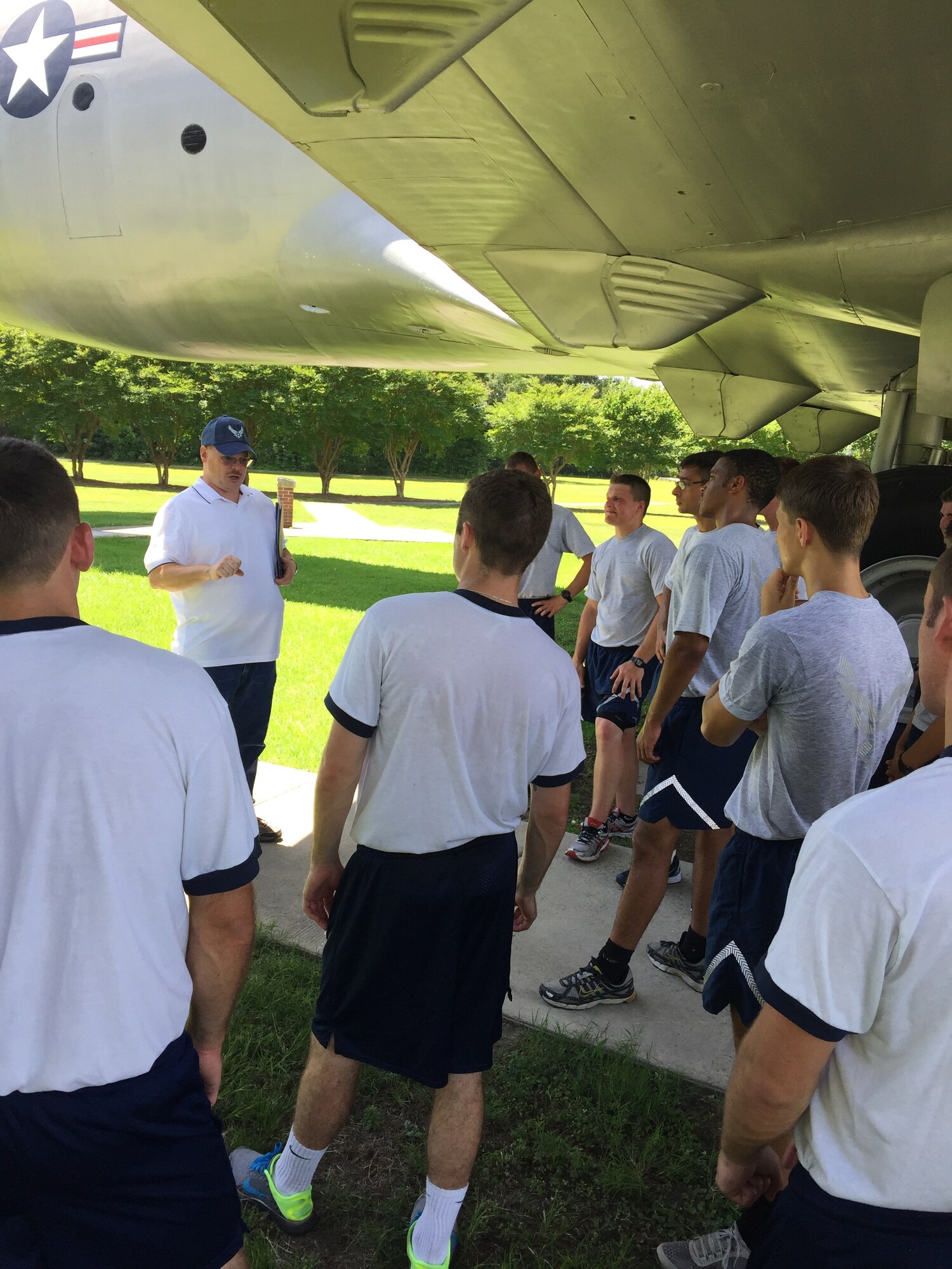 As part of an "Amazing Race" style event, 20 U.S Air Force Academy and Reserve Officers' Training Corps cadets visited Heritage Park June 15, 2015 at Joint Base Charleston, S.C., where Stan Gohl, the 437th Airlift Wing historian briefed the group on the history of the 437th AW and the three static jets that reside in the air park.  The cadets also visited Combat Arms Training and Maintenance where they handled weapons ranging from the M-9 pistol to a .50 Cal Sniper Rifle; Outdoor Recreation where they climbed a rock wall, challenging themselves to use team work to ensure everyone made it to the top. Lastly they ended the day with a friendly volleyball competition. During each stop, the Airman's Creed was incorporated into the visit and what the creed means to the enlisted personnel. The cadets are visiting JB Charleston as part of Operation Air Force, which exposes them to a real-world Air Force environment and provides them the opportunity to see how base components work together to meet the mission. This is the first of three groups scheduled to visit the base. (U.S. Air Force photo / Capt. Brian Walker)   

