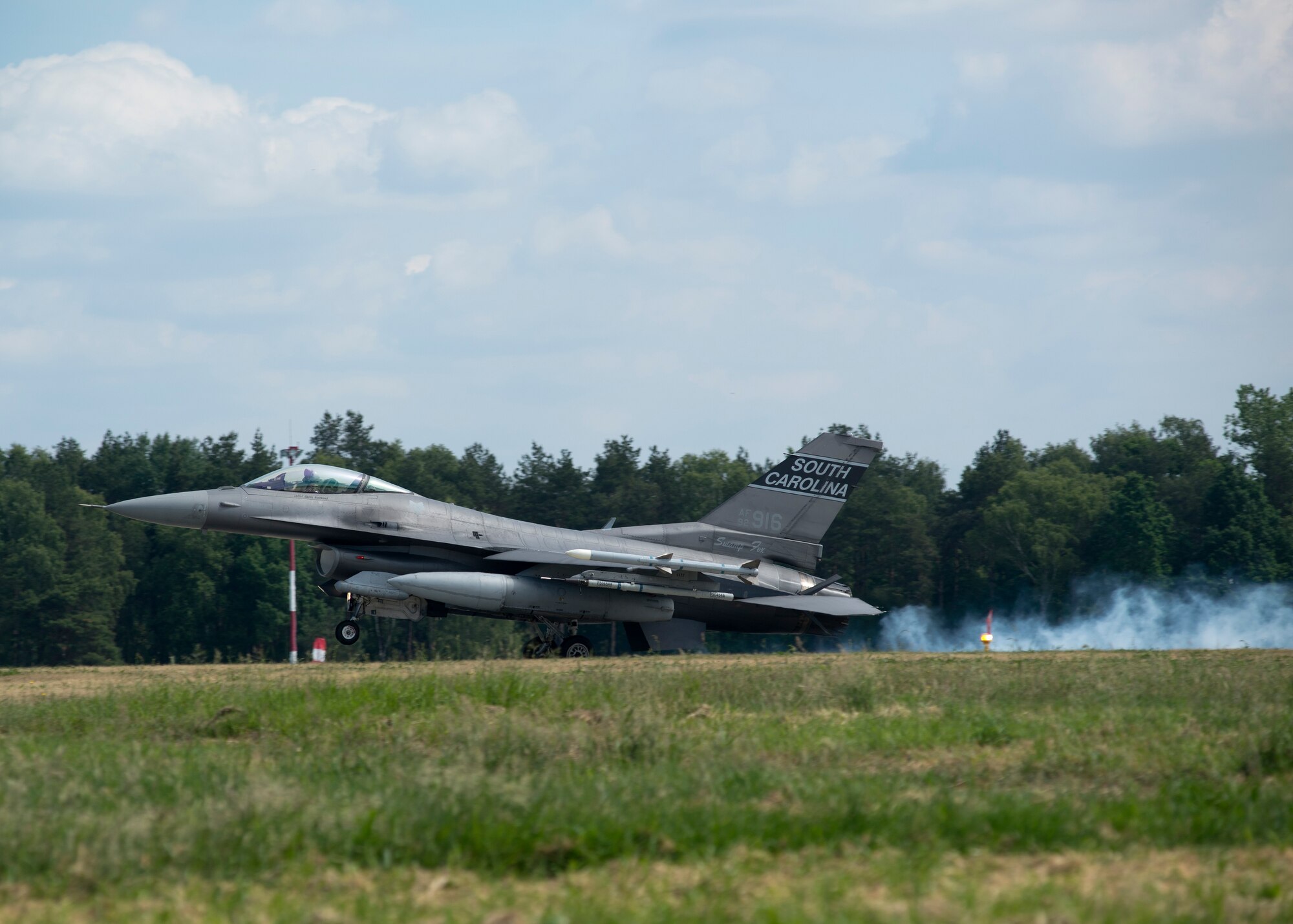 An F-16 from the South Carolina Air National Guard, lands at Łask Air Base, Poland, June 11, 2015. The 157th Fighter Squadron ANG unit is deployed to Poland in support of the aviation detachment rotation. The AVDET is an opportunity for total force Airmen to hone their skills in a forward location while participating in bi-lateral training with a key ally, Poland. (U.S. Air Force photo/Tech. Sgt. Paul Villanueva II)