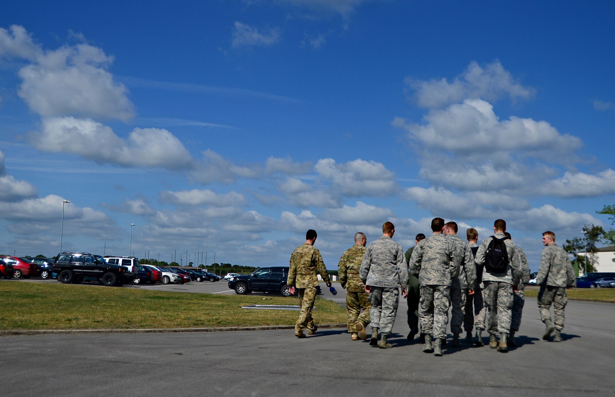 Personnel assigned to the 56th Rescue Squadron escort U.S. Air Force Academy cadets during a tour of their facility at Royal Air Force Lakenheath, England, June 10, 2015. The cadets departed the academy in Colorado Springs, Co., to visit RAF’s Lakenheath and Mildenhall to learn how overseas bases operate and support the Air Force mission. (U.S. Air Force photo by Senior Airman Erin O’Shea/Released)