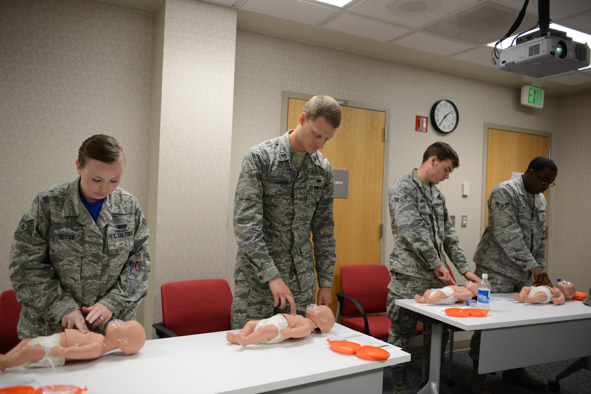 Andersen Airmen attend a Heartsaver CPR course June 12, 2015, at Andersen Air Force Base, Guam. The 36th Medical Group education and training section offers courses to provide the most accurate and up-to-date lifesaving practices for members. (U.S. Air Force photo by Airman 1st Class Arielle Vasquez/Released)
