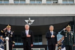 U.S. Defense Secretary Chuck Hagel, second from left, and U.S. Army Gen. Martin E. Dempsey, left, stand with South Korean Defense Minister Kim Kwan-jin, second from right, and South Korean army Gen. Jung Seung-jo, his country's chairman of the Joint Chiefs of Staff, during an honor cordon at the Ministry of Defense in Seoul, South Korea, Oct. 2, 2013. DOD photo by Erin A. Kirk-Cuomo 
