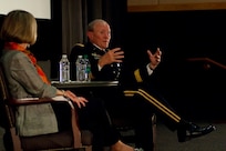 U.S. Army Gen. Martin E. Dempsey, the chairman of the Joint Chiefs of Staff, right, answers a question during a town hall with service members, families and civilians in Seoul, South Korea, Sept. 30, 2013. Dempsey and his wife, Deanie Dempsey, visited with over 300 military community members stationed throughout South Korea, where they spoke about the goals and challenges of the Department of Defense. (Photo by Army Staff Sgt. Luke A. Graziani)