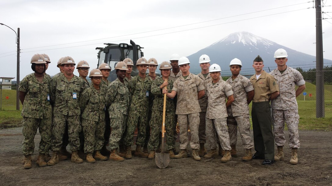 5 June 2015 - Camp Fuji, Gotemba, Shizuoka Pref., Japan - Colonel James Fullwood,  Commanding Officer of Combined Arms Training Center(CATC), Camp Fuji, takes a minute to thank the Seabees from NMCB-5. The Seabee Detachment recently arrived at CATC, Camp Fuji, and have already put their skills to great use by beginning the construction on a Vehicle Staging Lot. Once complete, the lot will allow for training units to pre-stage vehicles with ammo, prior to going into the field. This will allow for more time spent on the numerous live fire ranges offered at CATC Camp Fuji.