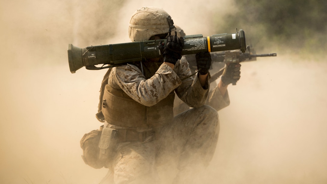 Lance Cpl. Michael Ferguson fires an M136 AT4 rocket launcher June 7 at Rodriguez Live Fire Complex, Republic of Korea, during Korean Marine Exchange Program 15-19. The AT4 is a shoulder-launched, 84 mm anti-armor weapon. It was designed to defeat modern main battle tanks. The exercise allows the battalion to maintain readiness and build the mutual strength and friendship between the ROK Marine Corps and U.S. Marine Corps. Ferguson from Falls Church, Virginia, is an infantry assaultman with Company I, 3rd Battalion, 2nd Marine Regiment, 3rd Marine Division, III Marine Expeditionary Force.