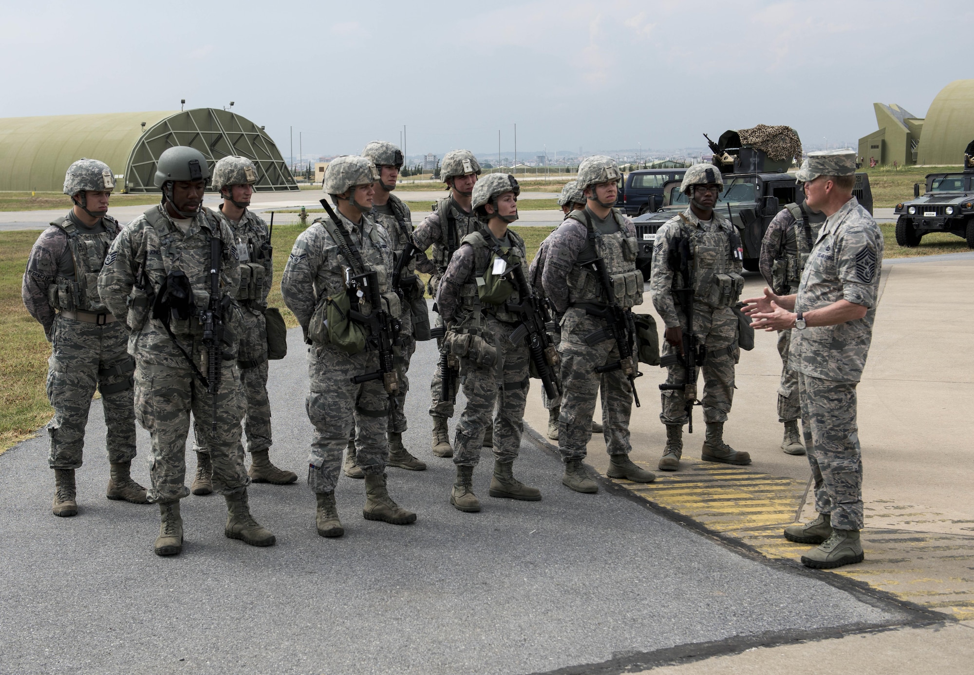 Chief Master Sgt. of the Air Force James Cody meets with members from the 39th Security Forces Squadron to learn mission capabilities June 17, 2015, at Incirlik Air Base, Turkey. Cody met and discussed Air Force policies and goals with Airmen during his visit to Incirlik and received a firsthand look at the base's critical role in supporting the Air Force mission. (U.S. Air Force photo/Airman 1st Class Cory W. Bush)