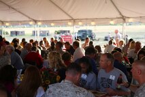 Service members and local community leaders attend an Appreciation Dinner to honor the mutual support civilians and military members exchange, aboard Marine Corps Base Camp Pendleton, Calif., June 13, 2015. The guests were given the opportunity to see the training and atmosphere the Marines experience when deployed.