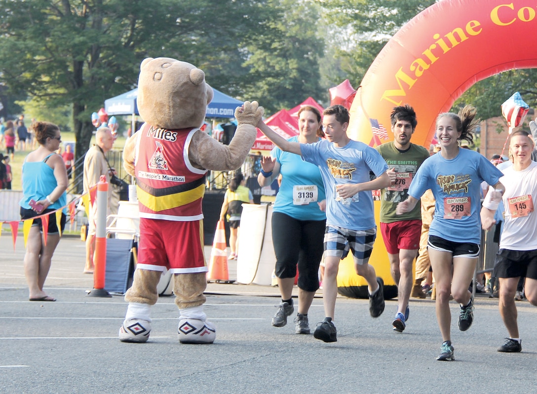 Runners start the Run Amuck Race, June 13, Quantico Marine Corps Base. 