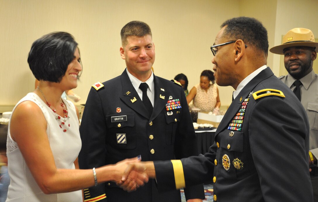 From right: Brig. Gen. C. David Turner, U.S. Army Corps of Engineers South Atlantic Division commander, welcomes Col. Marvin Griffin, Savannah District commander, and his wife, Alison, following Griffin’s change of command ceremony at Savannah’s Hyatt Regency Hotel, June 19.