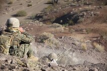A sniper team with 1st Battalion, 7th Marine Regiment, 1st Marine Division, I Marine Expeditionary Force engages targets 880 meters away with a Barrett M82A1 Special Application Scoped Rifle during 1/7’s Marine Corps Combat Readiness Evaluation aboard Marine Corps Air Ground Combat Center Twentynine Palms, Calif., June 9, 2015.  Marines from 1/7 and 2nd battalion, 7th Marine Regiment are currently in preparation for deployment with the Special Purpose Marine Air Ground Task Force (SPMAGTF) scheduled to depart in support of Operation Inherent Resolve later this year.