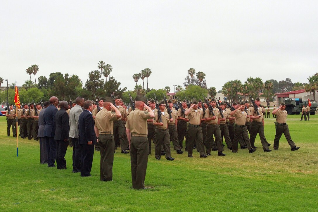 Sergeant Maj. William T. Sowers, the sergeant major of 1st Marine Division, I Marine Expeditionary Force, and Sgt. Maj. David L. Jobe, the division's previous sergeant major, are joined in the viewing area by previous sergeants major of 1st Marine Division during the pass in review at a relief and appointment ceremony aboard Marine Corps Base Camp Pendleton, Calif., June 12, 2015. Sowers is returning to the division after serving as the battalion sergeant major for 1st Battalion, 5th Marine Regiment, from June 2008 to November 2010. (U.S. Marine Corps photo by Lance Cpl. Caitlin Bevel)