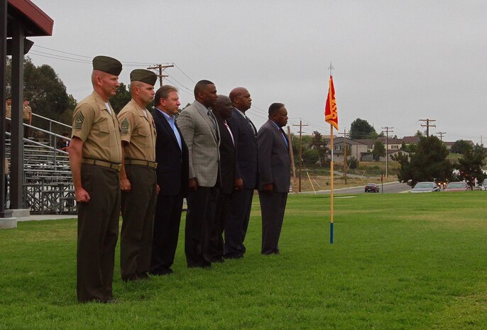 Sergeant Maj. William T. Sowers, the sergeant major of 1st Marine Division, I Marine Expeditionary Force, and Sgt. Maj. David L. Jobe, the division's previous sergeant major, are joined in the viewing area by previous sergeants major of 1st Marine Division during a relief and appointment ceremony aboard Marine Corps Base Camp Pendleton, Calif., June 12, 2015. Sowers is returning to the division after serving as the battalion sergeant major for 1st Battalion, 5th Marine Regiment, from June 2008 to November 2010. (U.S. Marine Corps photo by Lance Cpl. Caitlin Bevel)