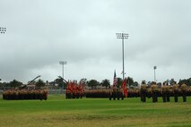 Marines of 1st Marine Division, I Marine Expeditionary Force, prepare to welcome Sgt. Maj. William T. Sowers as the new 1st Marine Division sergeant major during a relief and appointment ceremony aboard Marine Corps Base Camp Pendleton, Calif., June 12, 2015. Sowers is returning to the division after serving as the battalion sergeant major for 1st Battalion, 5th Marine Regiment, from June 2008 to November 2010. (U.S. Marine Corps photo by Lance Cpl. Caitlin Bevel)