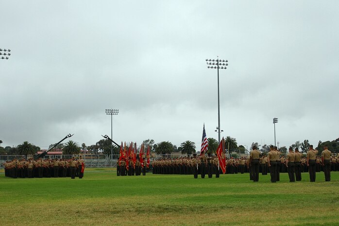 Marines of 1st Marine Division, I Marine Expeditionary Force, prepare to welcome Sgt. Maj. William T. Sowers as the new 1st Marine Division sergeant major during a relief and appointment ceremony aboard Marine Corps Base Camp Pendleton, Calif., June 12, 2015. Sowers is returning to the division after serving as the battalion sergeant major for 1st Battalion, 5th Marine Regiment, from June 2008 to November 2010. (U.S. Marine Corps photo by Lance Cpl. Caitlin Bevel)