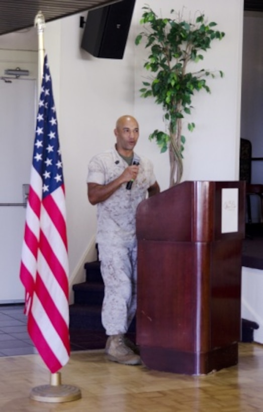 First Sgt. Miguel A. Betancourt III, Headquarters and Service Company first sergeant, 2nd Battalion, 3rd Marine Regiment, addresses Corporals Course Class 1-15 in the Lanai Ballroom of The Officers’ Club, June 12, 2015. Betancourt was the guest speaker at the graduation ceremony for more than 40 corporals graduating from the course, which was sponsored by the “Island Warriors.” (U.S. Marine Corps photo by Kristen Wong/Released)