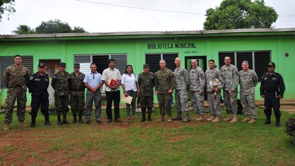 PUERTO LEMPIRA, Honduras – Participants from a bi-lateral discussion pose for a photo June 18, 2015, in Puerto Lempira, Honduras. The participants included leadership from Gracias a Dios Department as well as the Special Purpose Marine Air Ground Task Force-Southern Command and Joint Task Force-Bravo; the meeting provided clarity on the Marines’ upcoming construction projects in Gracias a Dios.   (U.S. Air Force Photo by Capt. Christopher Love)