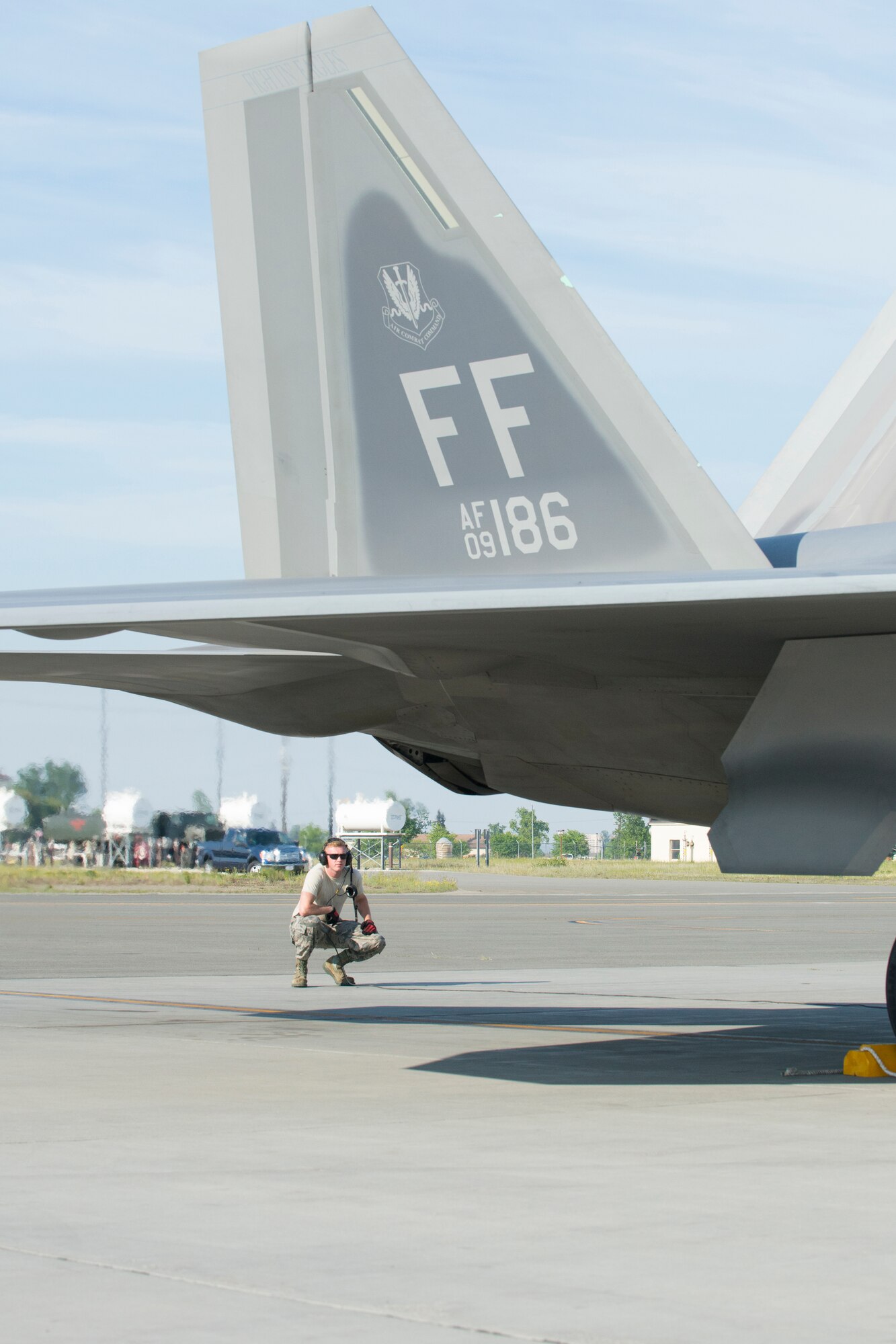 Senior Airman Craig Lively, 94th Aircraft Maintenance Unit Crew Chief, Joint Base Langley-Eustis, conducts a pre-launch inspection of an F-22 Raptor during Exercise Northern Edge 15 at JBER, Alaska, June 15, 2015. Pilots and maintainers from the 192nd Fighter Wing, Virginia Air National Guard and active duty Airmen from the 1st Fighter Wing, Joint Base Langley-Eustis are participating in the two-week training exercise. Northern Edge 2015 is Alaska’s premier joint training exercise designed to perfect mission operations, techniques and procedures as well as enhance interoperability across all military services, Reserves and Air National Guard forces. (U.S. Air Force photo by Staff Sgt. Jonathan Garcia/Released)