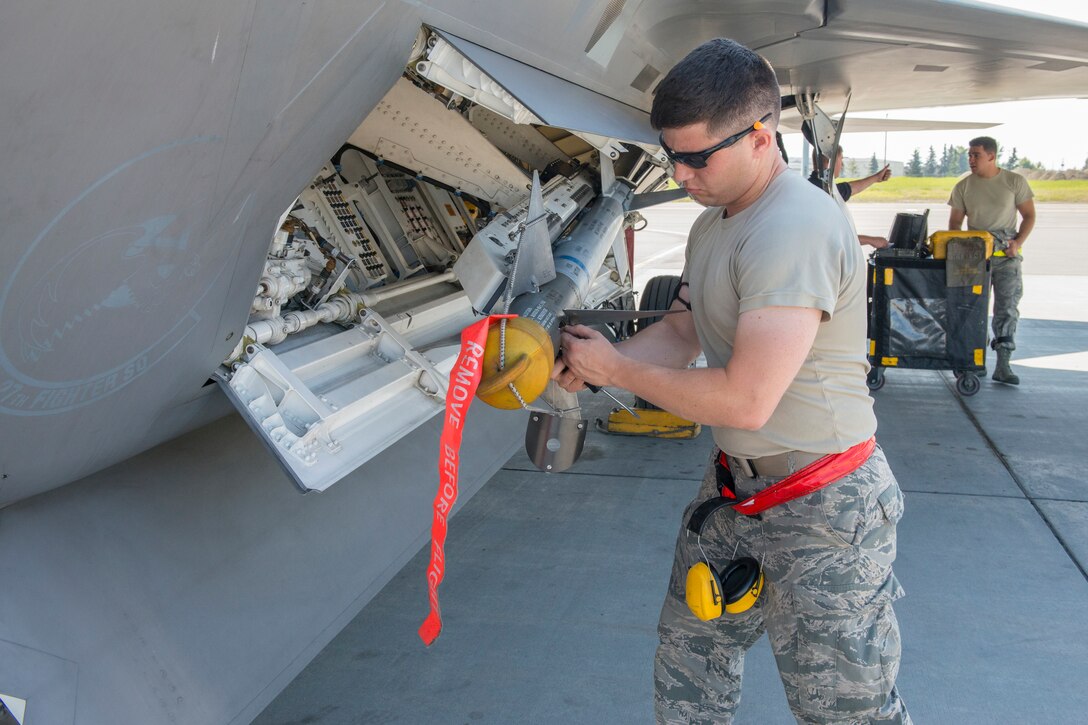Senior Airman Sean Murphy, 192nd Aircraft Maintenance Squadron, Virginia Air National Guard, performs maintenance on an AIM-9 Sidewinder during Exercise Northern Edge 15 at JBER, Alaska, June 15, 2015. Pilots and maintainers from the 192nd Fighter Wing, Virginia Air National Guard and active duty Airmen from the 1st Fighter Wing, Joint Base Langley-Eustis are participating in the two-week training exercise. Northern Edge 2015 is Alaska’s premier joint training exercise designed to perfect mission operations, techniques and procedures as well as enhance interoperability across all military services, Reserve and Air National Guard forces. (U.S. Air Force photo by Staff Sgt. Jonathan Garcia/Released)