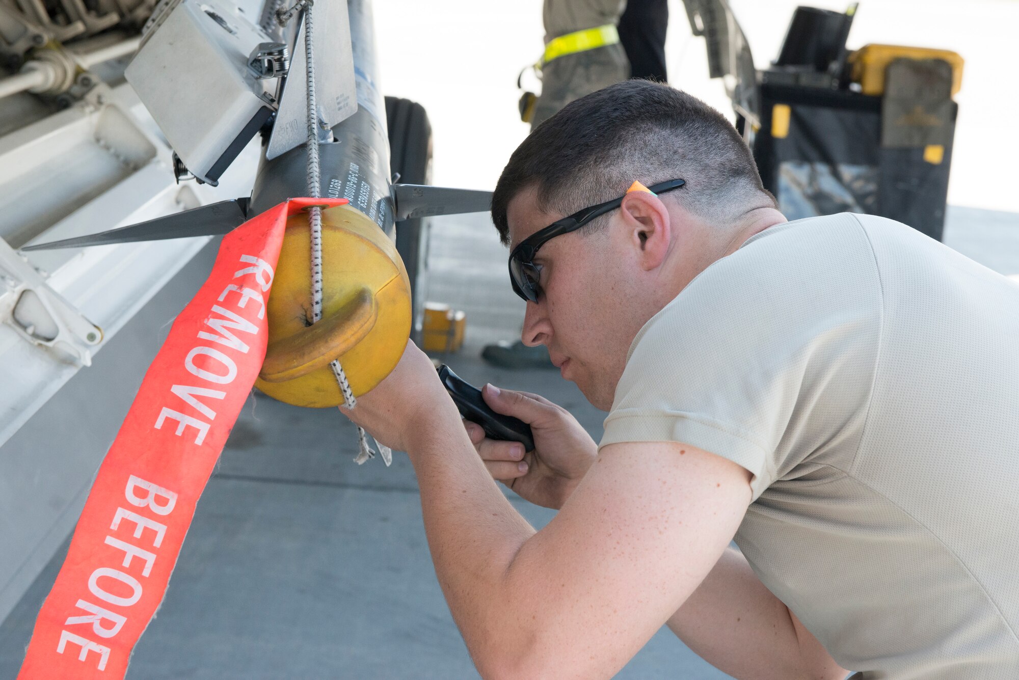Senior Airman Sean Murphy, 192nd Aircraft Maintenance Squadron, Virginia Air National Guard, performs maintenance on an AIM-9 Sidewinder during Exercise Northern Edge 15 at JBER, Alaska, June 15, 2015. Pilots and maintainers from the 192nd Fighter Wing, Virginia Air National Guard and active duty Airmen from the 1st Fighter Wing, Joint Base Langley-Eustis are participating in the two-week training exercise. Northern Edge 2015 is Alaska’s premier joint training exercise designed to perfect mission operations, techniques and procedures as well as enhance interoperability across all military services, Reserve and Air National Guard forces. (U.S. Air Force photo by Staff Sgt. Jonathan Garcia/Released)