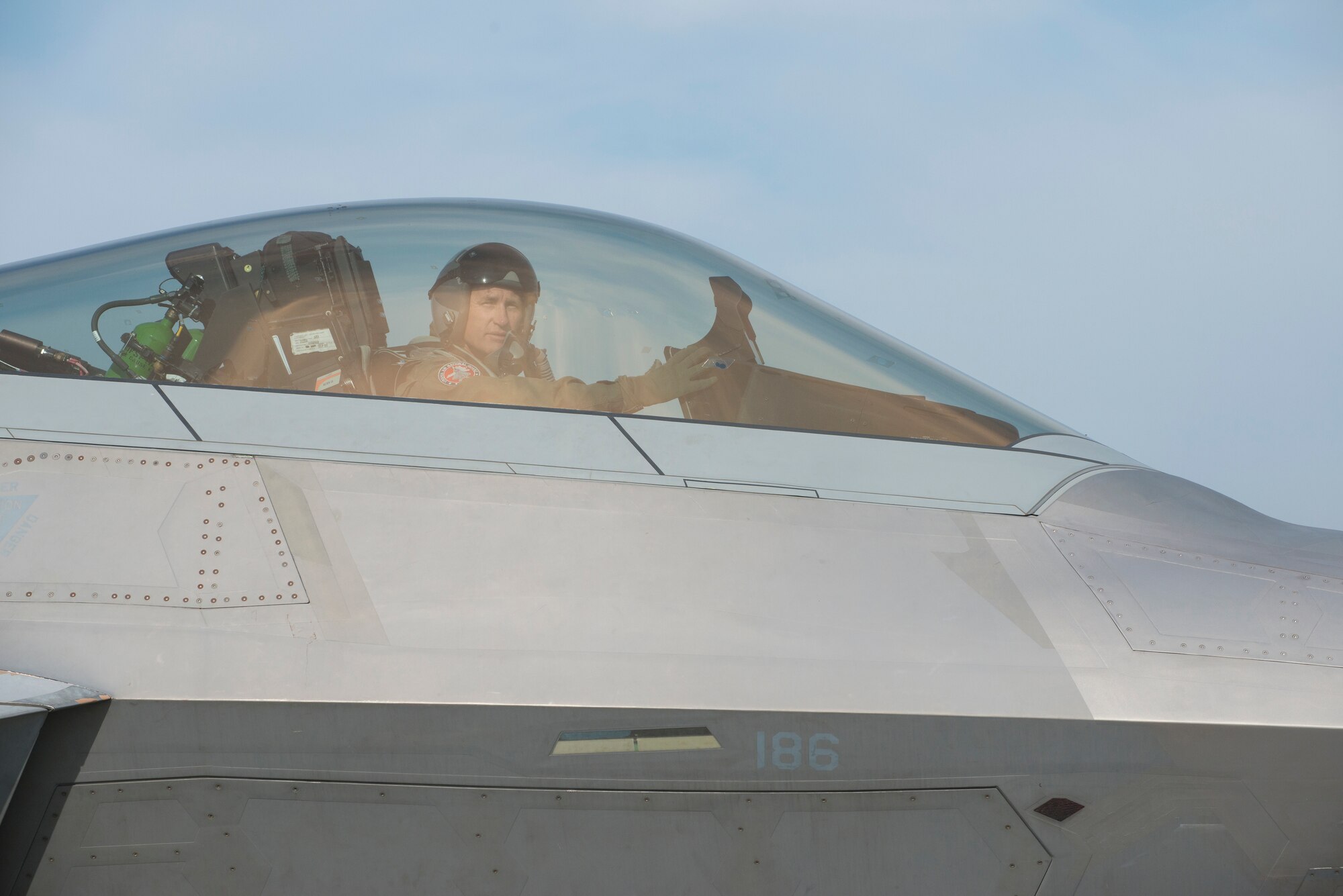 Col. Pat McAtee, 192nd Fighter Wing Operations Group commander, looks down the runway during Exercise Northern Edge 15 at JBER, Alaska, June 15, 2015. Pilots and maintainers from the 192nd Fighter Wing, Virginia Air National Guard and active duty Airmen from the 1st Fighter Wing, Joint Base Langley-Eustis are participating in the two-week training exercise. Northern Edge 2015 is Alaska’s premier joint training exercise designed to perfect mission operations, techniques and procedures as well as enhance interoperability across all military services, Reserves and Air National Guard forces. (U.S. Air Force photo by Staff Sgt. Jonathan Garcia/Released)