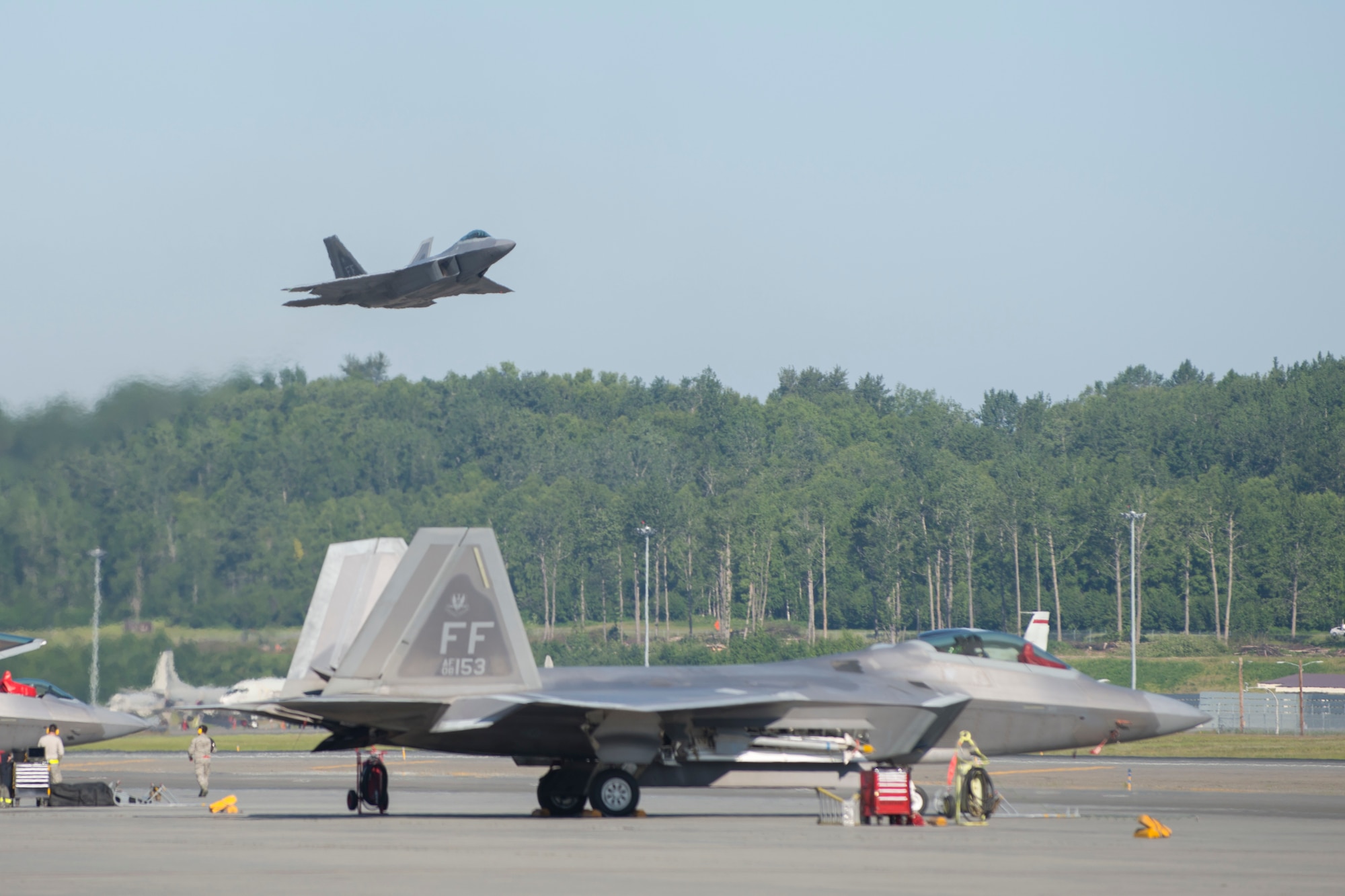 An Air Force F-22 Raptor from the 1st Fighter Wing, Langley Air Force Base, Va., takes off for a training mission during Exercise Northern Edge 2015 at JBER, Alaska, June 15, 2015. Northern Edge is Alaska’s premier joint training exercises designed to perfect mission operations, techniques and procedures as well as enhance interoperability across all military branches, Reserve and Air National Guard forces. (U.S. Air Force photo by Staff Sgt. Jonathan Garcia/Released)