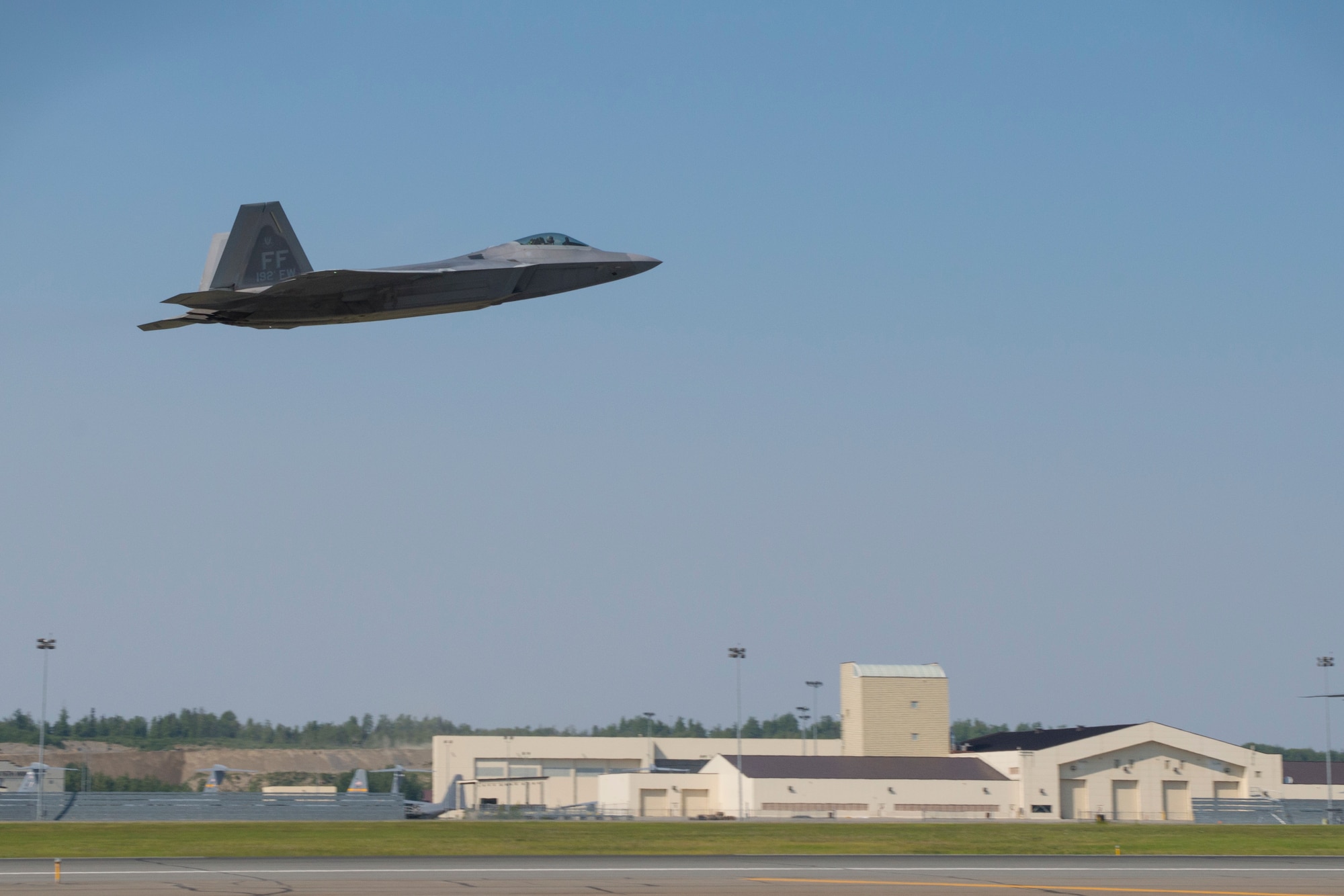 An Air Force F-22 Raptor from the Virginia Air National Guard 192nd Fighter Wing, Langley Air Force Base, Va., takes off for a training mission during Exercise Northern Edge 2015 at JBER, Alaska, June 15, 2015. Northern Edge is Alaska’s premier joint training exercises designed to perfect mission operations, techniques and procedures as well as enhance interoperability across all military branches, Reserve and Air National Guard forces. (U.S. Air Force photo by Staff Sgt. Jonathan Garcia/Released)