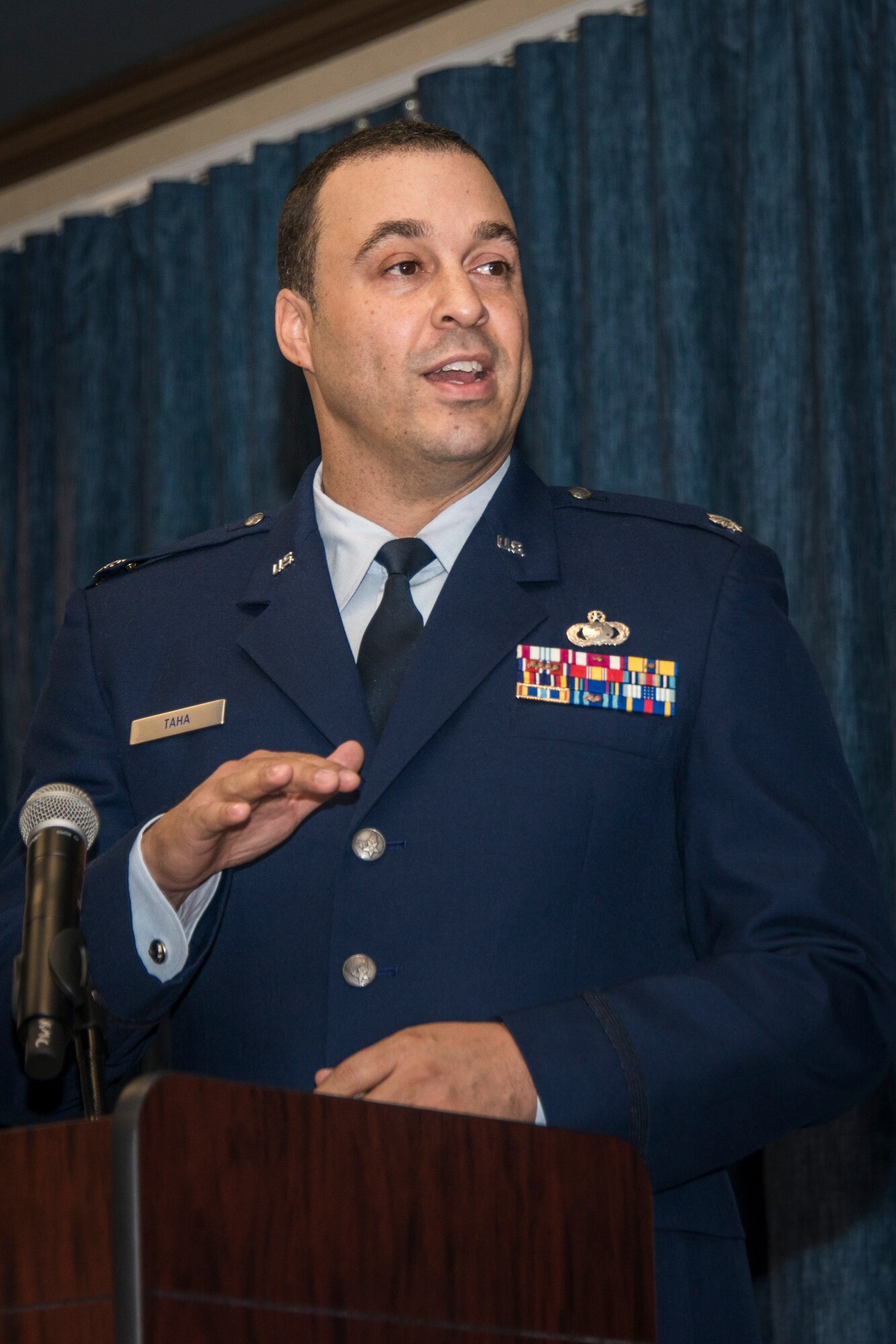 Lt. Col. Khalim Taha, 92nd Comptroller Squadron commander, addresses his Team Fairchild Airmen and others in attendance explaining his priorities and expectations over the next few years during the 92nd CPTS change of command ceremony June 19, 2015, at Fairchild Air Force Base, Wash. As the 92nd CPTS commander, Taha is the principal advisor to the installation commander on all budgetary and fiscal matters as well as provide administrative oversight to 15 wing staff agencies consisting of more than 130 personnel. (U.S. Air Force photo/Staff Sgt. Benjamin W. Stratton)