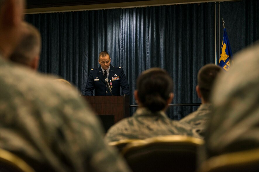 Maj. Kevin Watts, 92nd Comptroller Squadron former commander, addresses his Airmen, friends, coworkers and family thanking them for their dedication to the mission and teamwork during the 92nd CPTS change of command ceremony June 19, 2015, at Fairchild Air Force Base, Wash. Watts has led and worked in a variety of comptroller positions including those at the major command, numbered Air Force and wing. His global experience includes serving in Qatar and the United Arab Emirates. (U.S. Air Force photo/Staff Sgt. Benjamin W. Stratton)