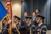 Senior Airmen Kimberly Carter and Stephanie George, 92nd Comptroller Squadron travel pay technicians, sing the national anthem as the Fairchild Honor Guard presents the colors during the 92nd CPTS change of command ceremony June 19, 2015, at Fairchild Air Force Base, Wash. The Star-Spangled Banner is the national anthem of the United States and has served in this capacity since a congressional resolution on March 3, 1931. Some historians note the song was also used officially by the U.S. Navy as early as 1889. (U.S. Air Force photo/Staff Sgt. Benjamin W. Stratton)