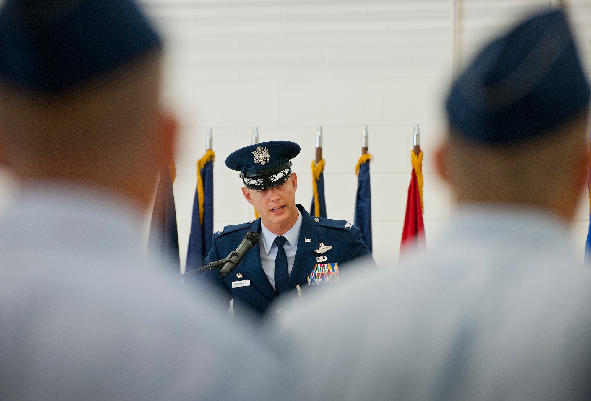 Col. Alexus Grynkewich speaks to his wing for the last time as their commander during the 53rd Wing change of command ceremony June 18 at Eglin Air Force Base, Fla.  Col. Adrian Spain assumed command of the wing from Grynkewich, who moves on to the Pentagon.  (U.S. Air Force photo/Samuel King Jr.)