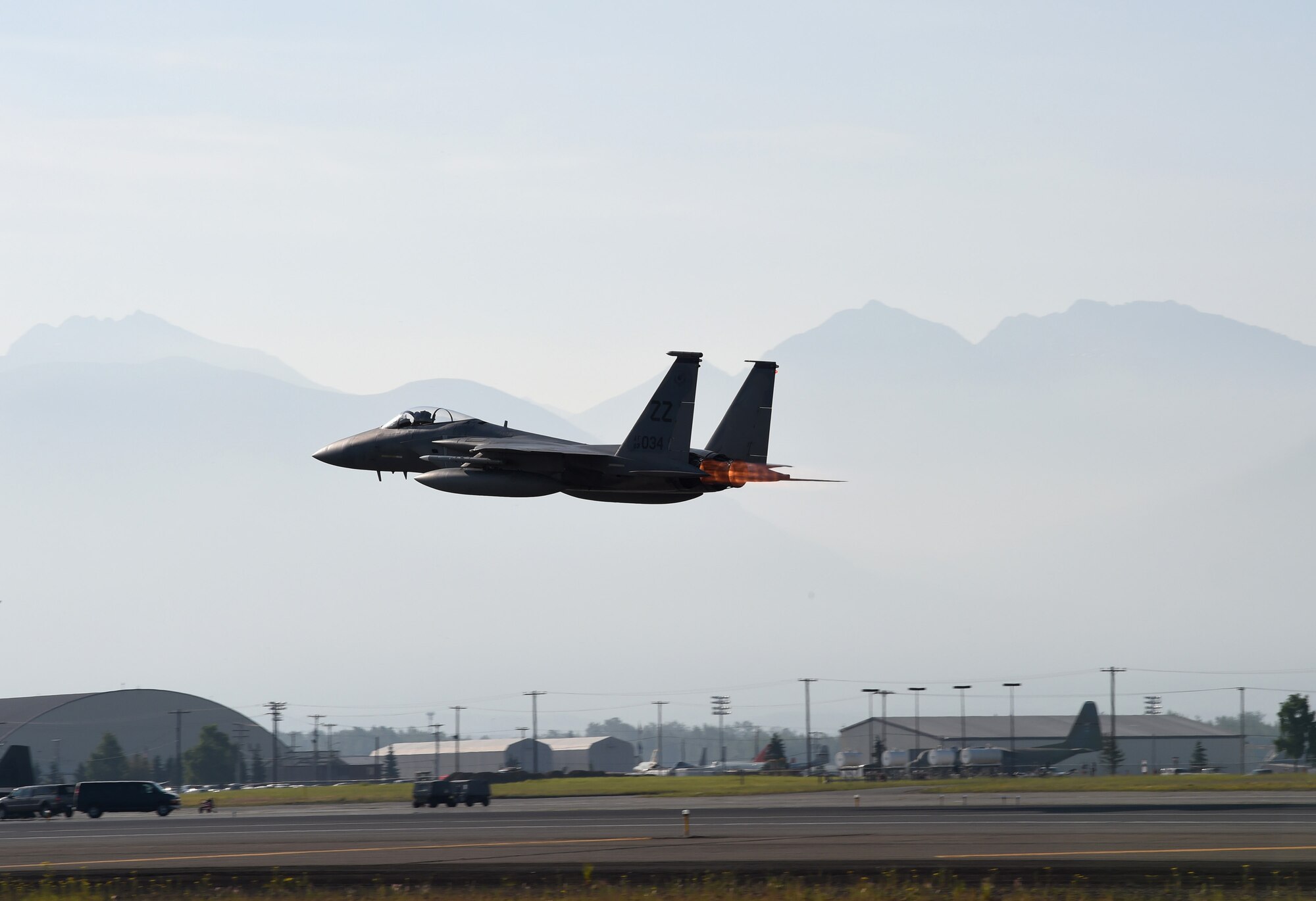 A U.S. Air Force F-15C Eagle launches from Joint Base Elmendorf-Richardson to participate in Exercise Northern Edge, June 18; 2015. Over 200 military aircraft from all services practiced operations; techniques and procedures while simultaneously enhancing interoperability during Northern Edge 2015 – Alaska’s premier joint training exercise. (U.S. Navy photo/Chief Mass Communication Specialist Larry Foos)