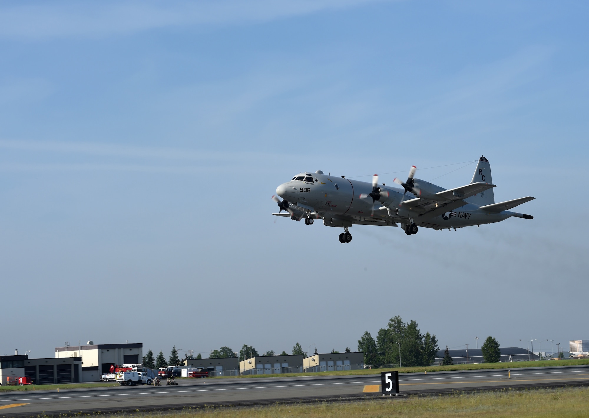 A U.S. Navy P-3 Orion launches from Joint Base Elmendorf-Richardson, Alaska to participate in Exercise Northern Edge, June 18, 2015. Over 200 military aircraft from all services practiced operations, techniques and procedures while simultaneously enhancing interoperability during Northern Edge 2015 – Alaska’s premier joint training exercise. (U.S. Navy photo/Chief Mass Communication Specialist Larry Foos)