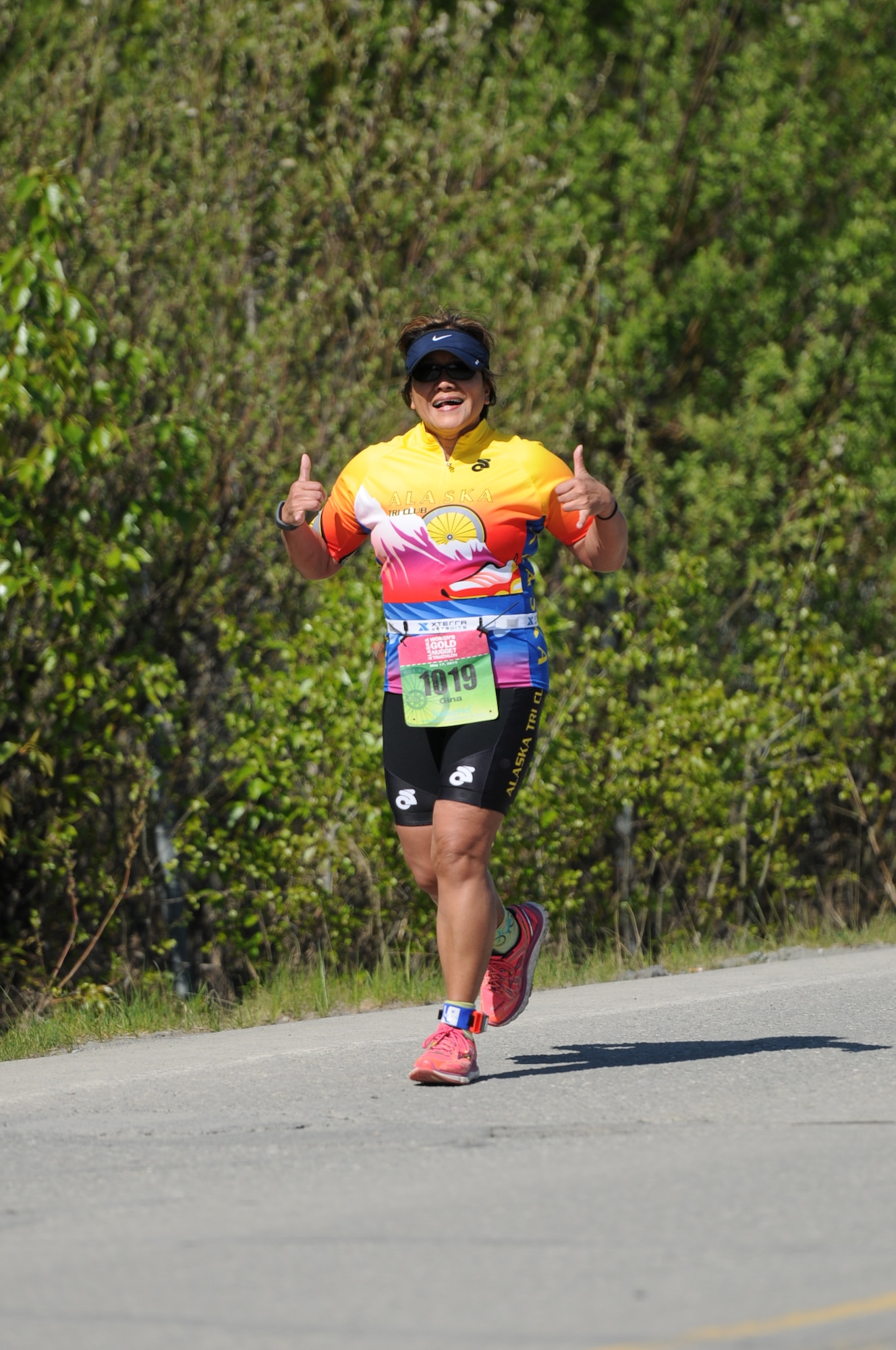 Maj. Gina Gorski, 477th Aerospace Medicine Flight interim commander and operations officer, participates in an annual triathlon in Anchorage, Alaska May 17. Gorski, who says participating in a triathlon was a life-long dream, hopes her participation in events like this encourages others to set goals and follow through with them. (Photo courtesy of Alaska Focus Photography)