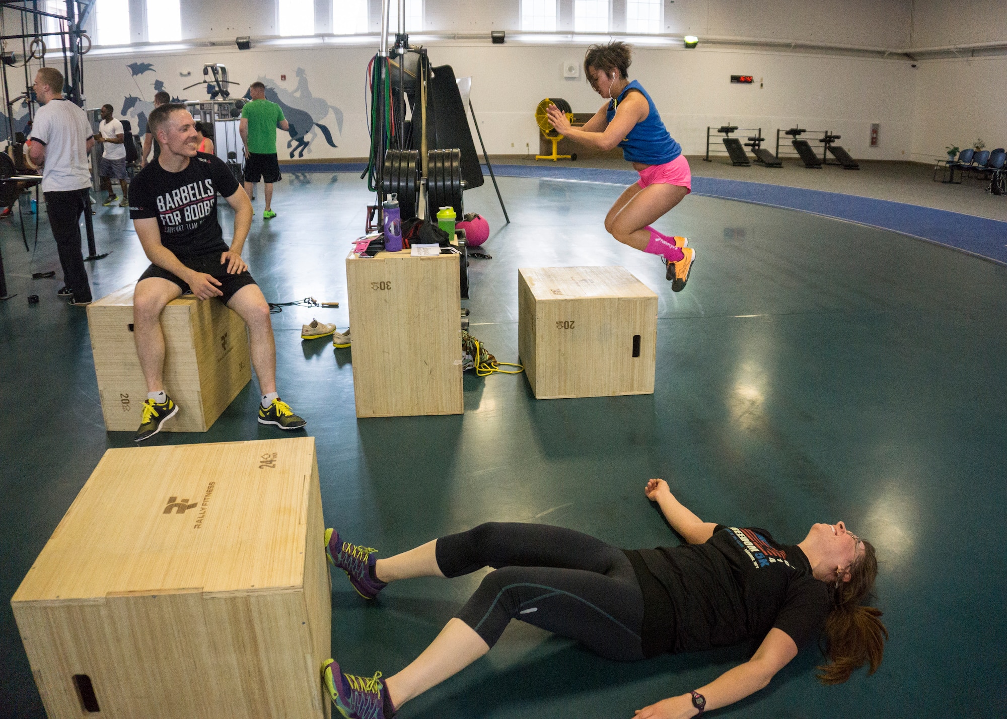 F.E. Warren Air Force Base members near the completion of their endurance training workout at Independence Hall Fitness Center, June 3, 2015. New endurance training equipment was recently purchased for the fitness center to provide more options for physical resiliency. (U.S. Air Force photo by Lan Kim)