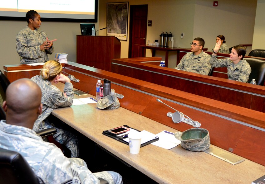Senior Master Sgt. LaToya Edwards, 2nd Munitions Squadron first sergeant, talks to Airmen during the Year of the Leader Seminar on Barksdale Air Force Base, La., June 17, 2015. The goal of the seminar was to develop Airmen into future leaders of the U.S Air Force.  (U.S. Air Force Photo/Airman 1st Class Mozer O. Da Cunha)