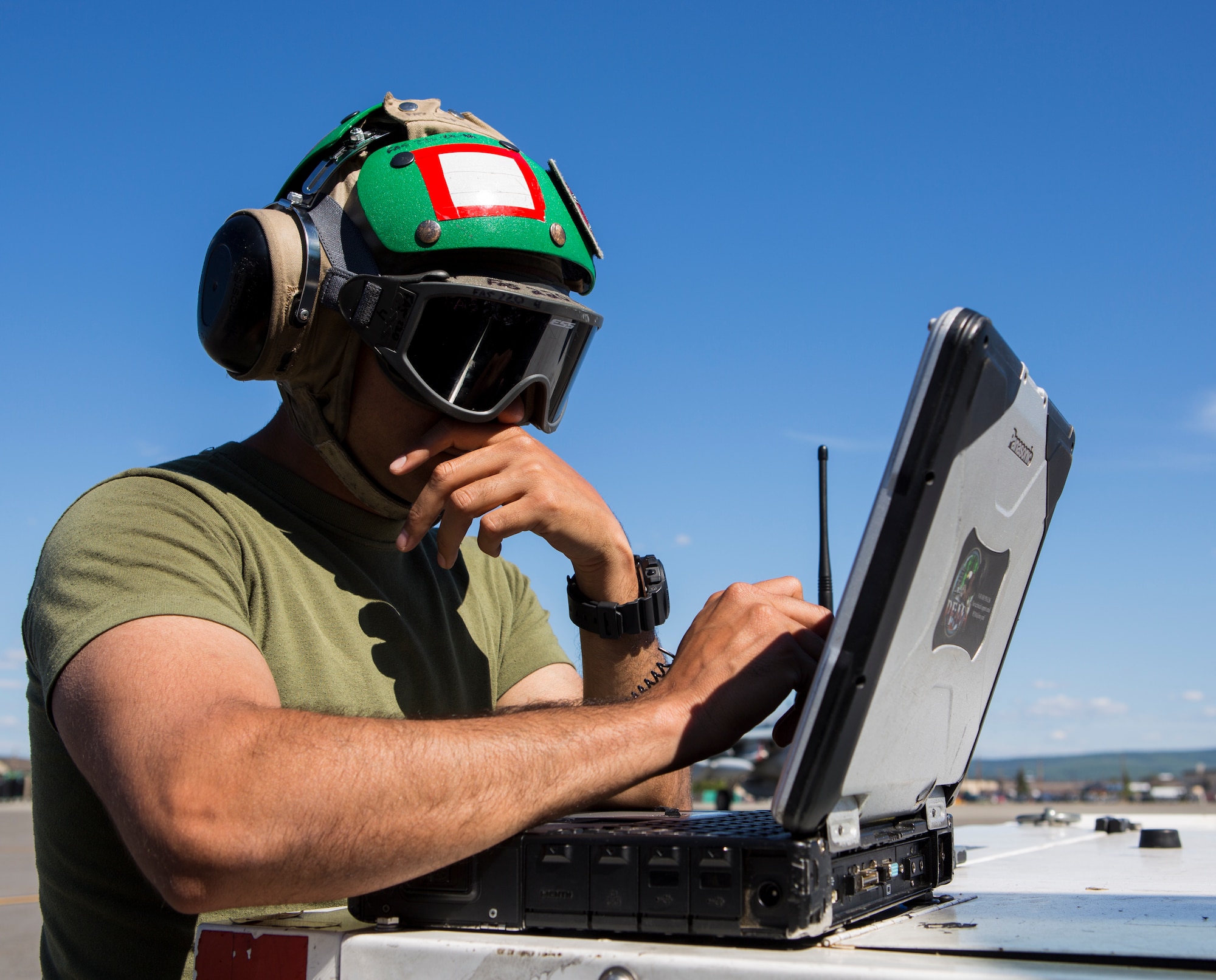 U.S. Marine Corps Cpl. Miguel S. Garcia, Marine Tactical Electronic Warfare Squadron 2, 2nd Marine Aircraft Wing, electrician, looks at a laptop while conducting routine maintenance on a U.S. Marine Corps EA-6B Prowler assigned to VMAQ-2, during Exercise Northern Edge 15 at Eielson Air Force Base, Alaska, June 17, 2015. Northern Edge is Alaska’s premier joint training exercise designed to practice operations, techniques and procedures as well as enhance interoperability among the services. Thousands of Service members from active duty, Reserve and National Guard units are involved. (U.S. Marine Corps photo by Cpl. Suzanne Dickson/ Released)