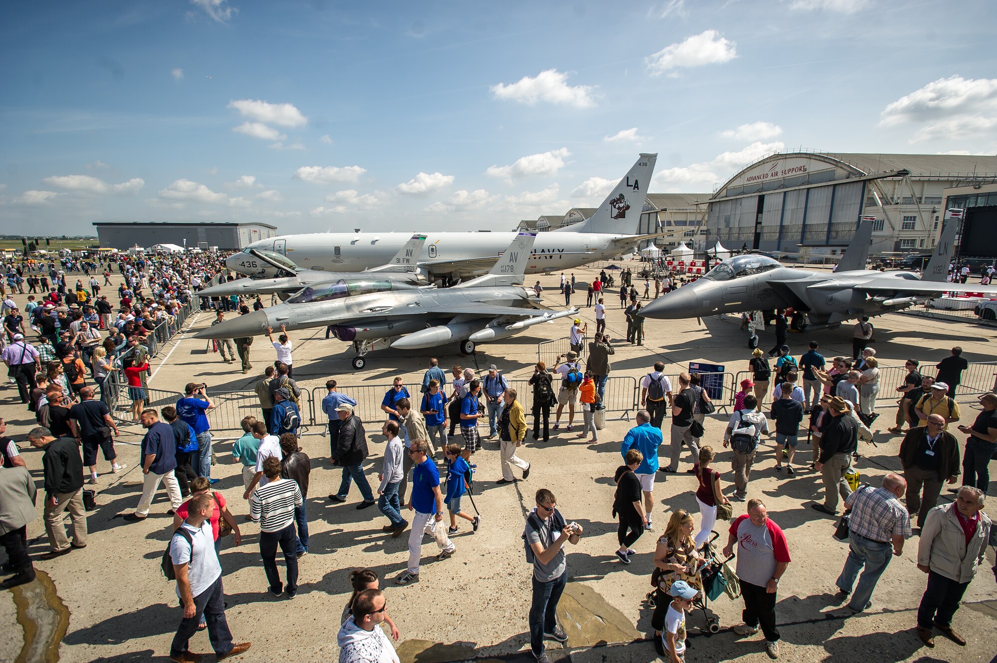 PARIS - People from all over the world gather around the U.S. military aircraft display during the Paris Air Show at Le Bourget Airport, France, June 19, 2015. The Paris Air Show provides a collaborative opportunity to share and strengthen the U.S. and European strategic partnership that has been forged during the last seven decades and is built on a foundation of shared values, experiences and vision. The event is expected to bring in 315,000 people, a record 2,215 companies, 150 aircraft, and will span 324,000 square meters. (U.S. Air Force photo/ Tech. Sgt. Ryan Crane)