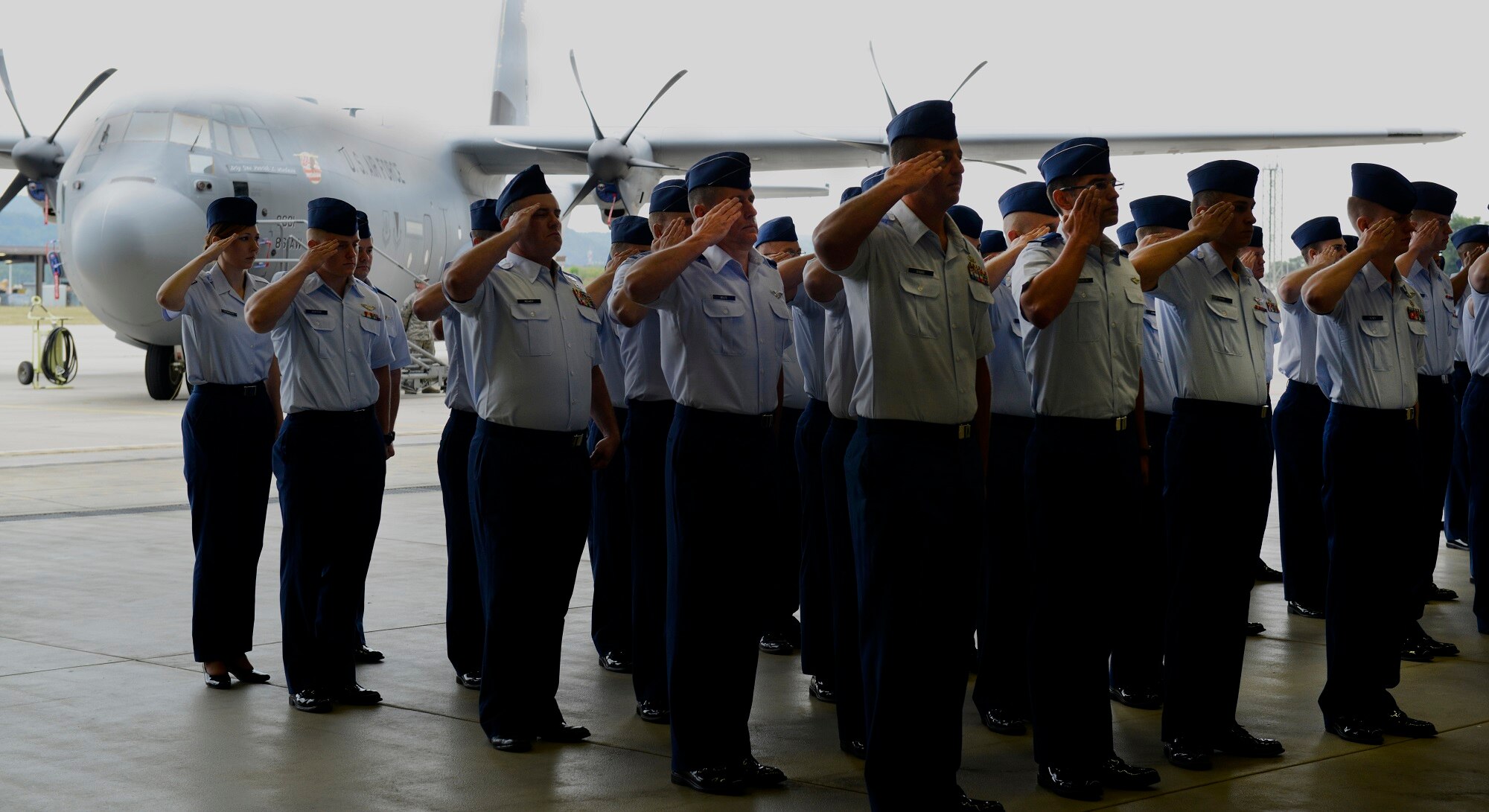 Airmen from the 86th Airlift Wing render their final salute to Brig. Gen. Patrick X. Mordente, outgoing 86th AW commander, during a change of command ceremony June 19, 2015, at Ramstein Air Base, Germany. Mordente relinquished command of the largest wing in Europe to Brig. Gen. Jon T. Thomas. (U.S. Air Force photo/Airman 1st Class Tryphena Mayhugh)