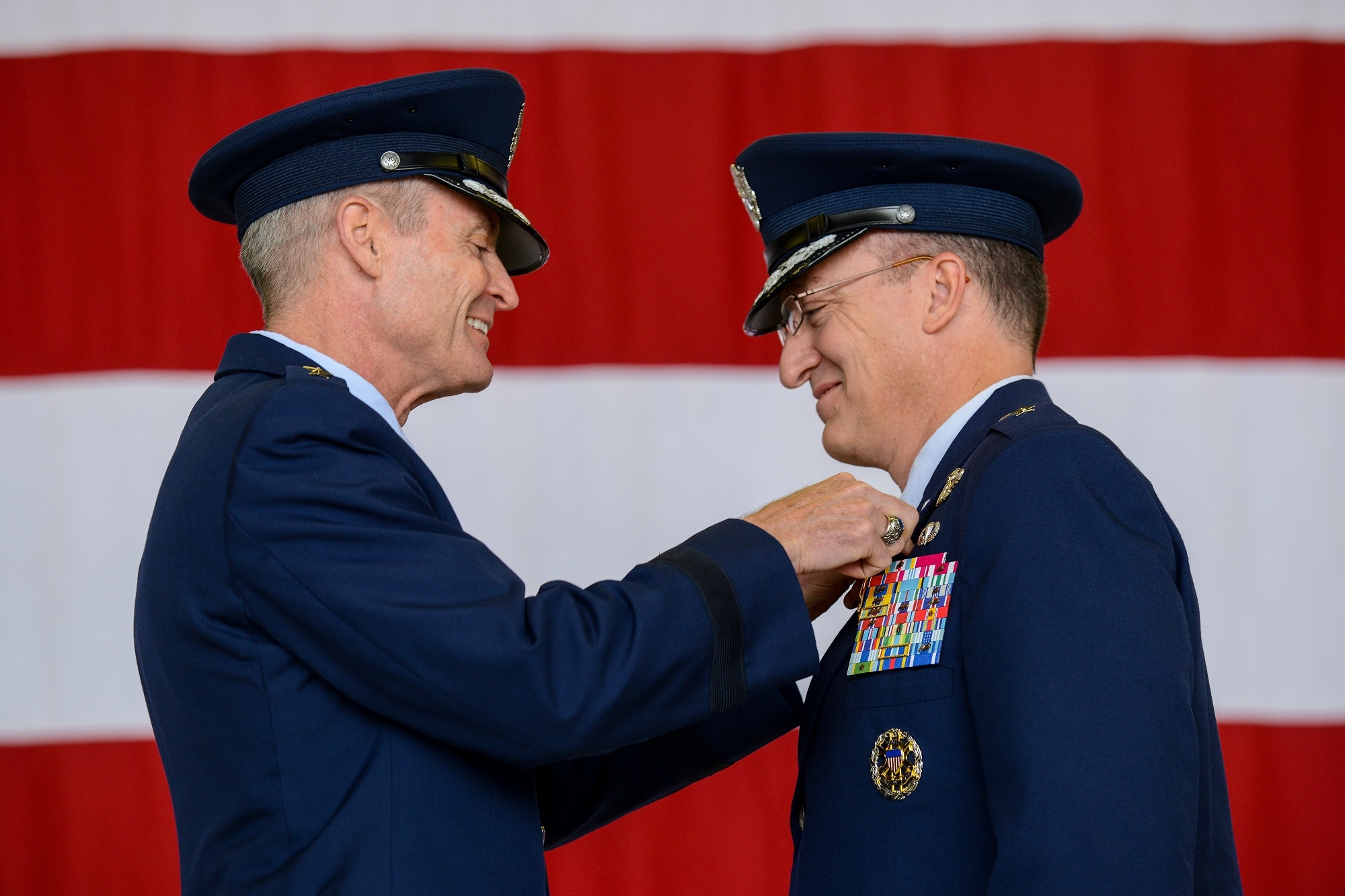 Lt. Gen. Darryl L. Roberson, 3rd Air Force and 17th Expeditionary Air Force commander, presents the Legion of Merit, first oak leaf cluster to Brig. Gen. Patrick X. Mordente, 86th Airlift Wing outgoing commander, during a change of command ceremony June 19, 2015, Ramstein Air Base, Germany.  Brig. Gen. Jon T. Thomas assumed command of the 86th AW and will now lead the mission in providing rapid air mobility through the Air Force’s premier power projection platform. (U.S. Air Force photo/Senior Airman Nicole Sikorski)