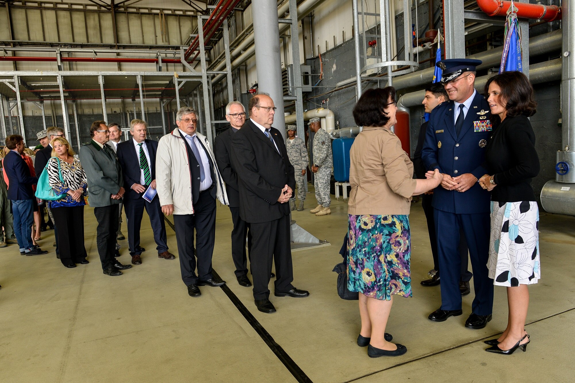 Brig. Gen. Jon T. Thomas, 86th Airlift Wing commander and his wife, Leah, greet prominent German civic leaders and locals in a receiving line after a change of command ceremony June 19, 2015, Ramstein Air Base, Germany.  At the ceremony, Thomas assumed command of the largest wing in Europe from Brig. Gen. Patrick X. Mordente. (U.S. Air Force photo/Senior Airman Nicole Sikorski)