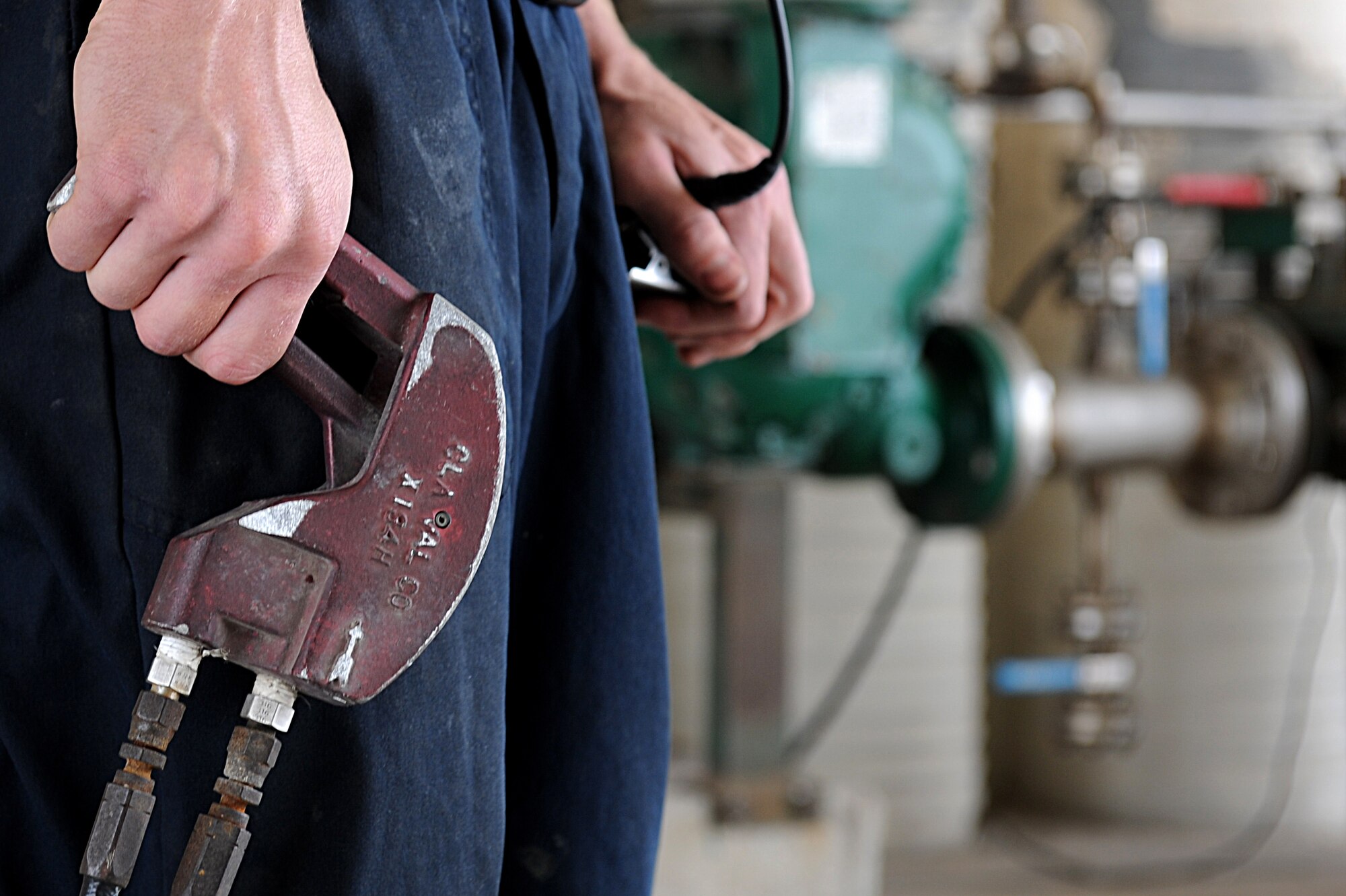Senior Airman Zachary Gant, 8th Aircraft Maintenance Squadron crew chief, fuels an F-16 Fighting Falcon during Surge Week at Kunsan Air Base, Republic of Korea, June 16, 2015. Surge Week tested the skills and wartime capabilities of Wolf Pack operators, maintainers and supporting agencies over a four-day window to simulate pilots' wartime flying rates. (U.S. Air Force photo by Senior Airman Divine Cox/Released)