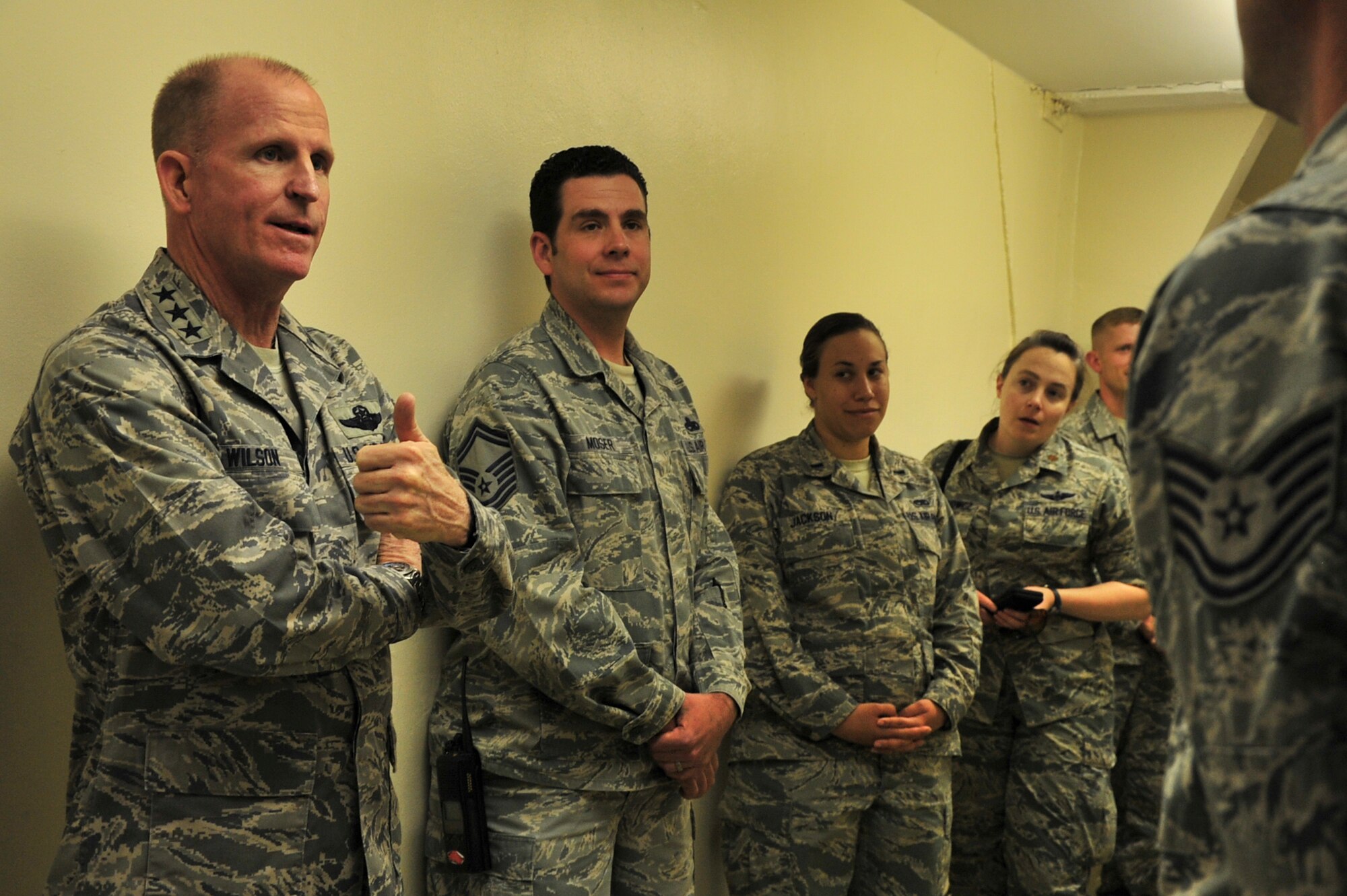 Lt. Gen. Stephen Wilson, Air Force Global Strike Command commander, gives Tech. Sgt. Thomas McGreggor, 5th Aircraft Maintenance Squadron electronic countermeasure specialist, a thumbs-up during his visit to Royal Air Force Fairford, England, June 18, 2015. Over 300 military personnel from five U.S. bases deployed to RAF Fairford in support of a bomber deployment which tested personnel in hot-pit refueling and engine running crew changes on B-2 Spirits and supported B-52 Stratofortress missions in the multi-national exercises BALTOPS 15 and Saber Strike 15. Wilson visited the base to see how the Airmen completed their mission in a forward-deployed location and asked if there was anything they needed from him to help them complete their mission and maintain morale. (U.S. Air Force photo/Senior Airman Malia Jenkins)