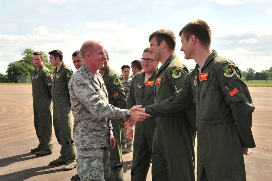 Lt. Gen. Stephen Wilson, Air Force Global Strike Command commander, greets aircrew members forward deployed to Royal Air Force Fairford, England, June 18, 2015. Wilson visited RAF Fairford to talk with the command’s Airmen and discuss the challenges and successes of the forward-deployed forces performing multi-national missions in the European area of operations during their support of the BALTOPS 15 and Saber Strike 15 exercises. (U.S. Air Force photo/Senior Airman Malia Jenkins)