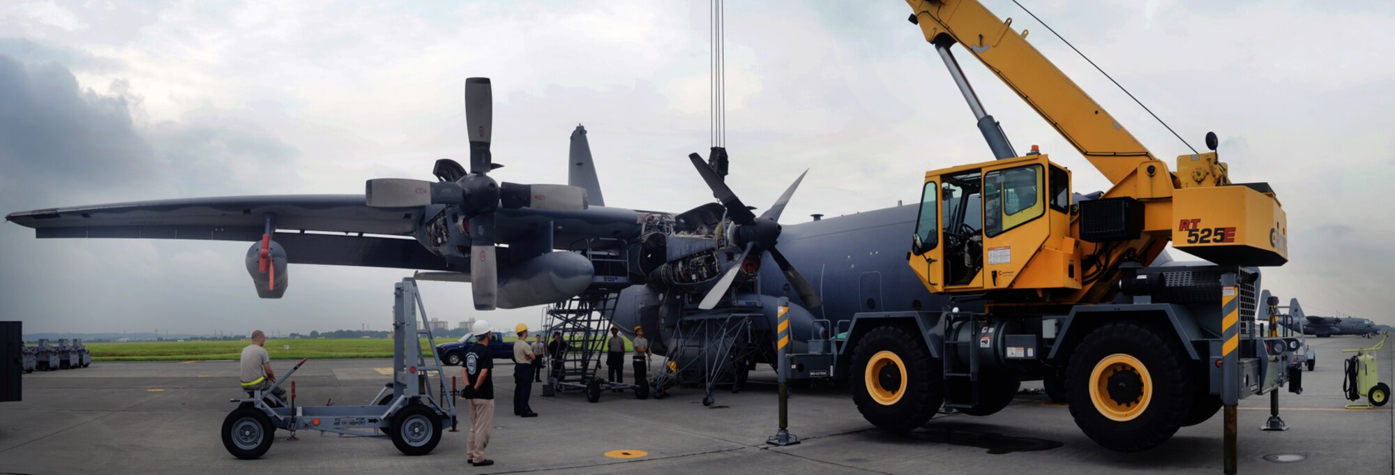 374th Maintenance Squadron prepare an engine from a MC-130 Combat Talon II for transport June 18, 2015, at Yokota Air Base, Japan. Each Airman worked to ensure that the engine was safely secured to the engine stand. (U.S. Air Force photo by Airman 1st Class Delano Scott/Released)