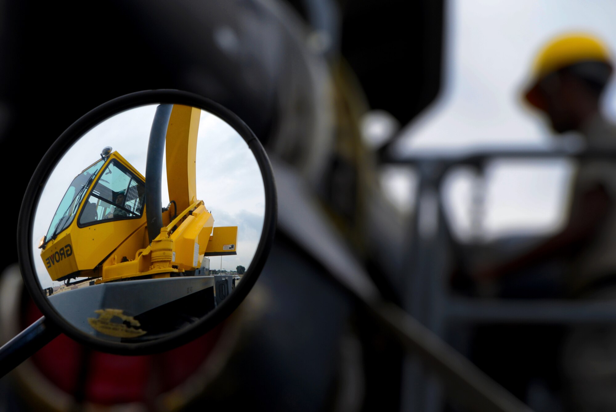 374th Maintenance Squadron Airmen prepare to extract an engine from a MC-130 Combat Talon II June 18, 2015, at Yokota Air Base, Japan. 374 MXS Airmen performed maintenance on the aircraft to ensure that it remains operational for its mission. (U.S. Air Force photo by Airman 1st Class Delano Scott/Released)