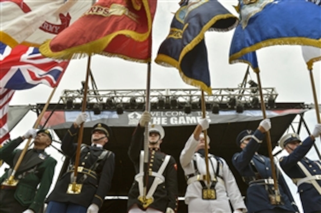 Service members present colors during the opening ceremony of the 2015 Department of Defense Warrior Games at the National Museum of the Marine Corps on Marine Corps Base Quantico, Va., June 19, 2015. 