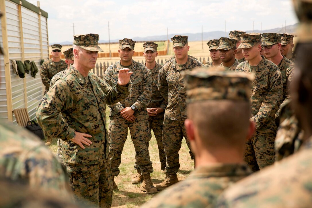 U.S. Marine Brig. Gen. Christopher J. Mahoney speaks to U.S. Marines participating in Khaan Quest 2015 at the Five Hills Training Area in Mongolia, June 20. Khaan Quest is a regularly scheduled, multinational exercise hosted annually by Mongolian Armed Forces and co-sponsored by U.S. Army, Pacific, and U.S. Marine Corps Forces, Pacific. Mahoney is the deputy commander of U.S. Marine Corps Forces, Pacific. The U.S. Marines are with 3rd Battalion, 2nd Marine Regiment, currently assigned to 4th Marine Regiment, 3rd Marine Division, III Marine Expeditionary Force under the unit deployment program.